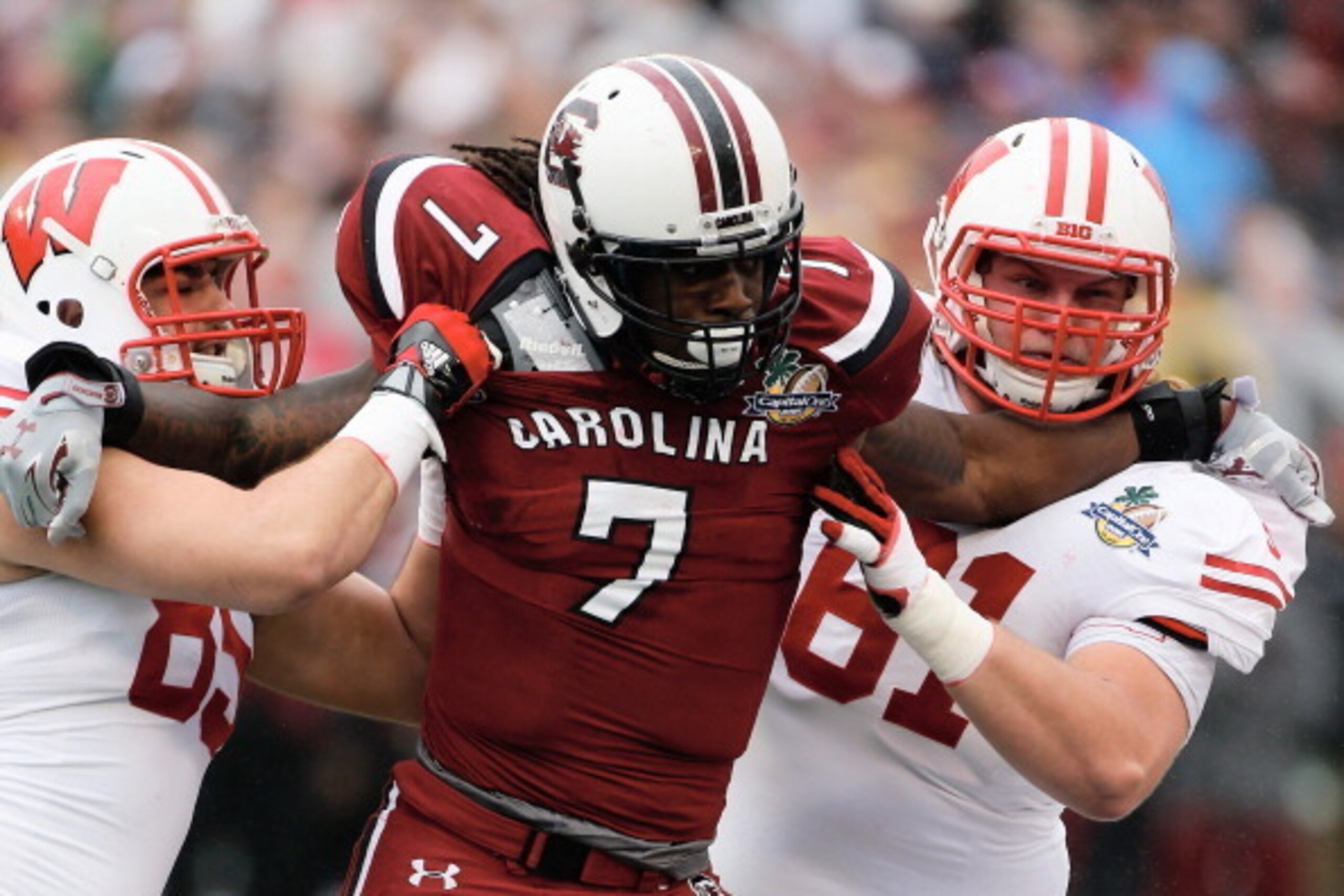 ORLANDO, FL - JANUARY 01:  Jadeveon Clowney #7 of the South Carolina Gamecocks in action during their game against the Wisconsin Badgers at the Capital One Bowl on January 1, 2014 in Orlando, Florida.  (Photo by Scott Halleran/Getty Images)