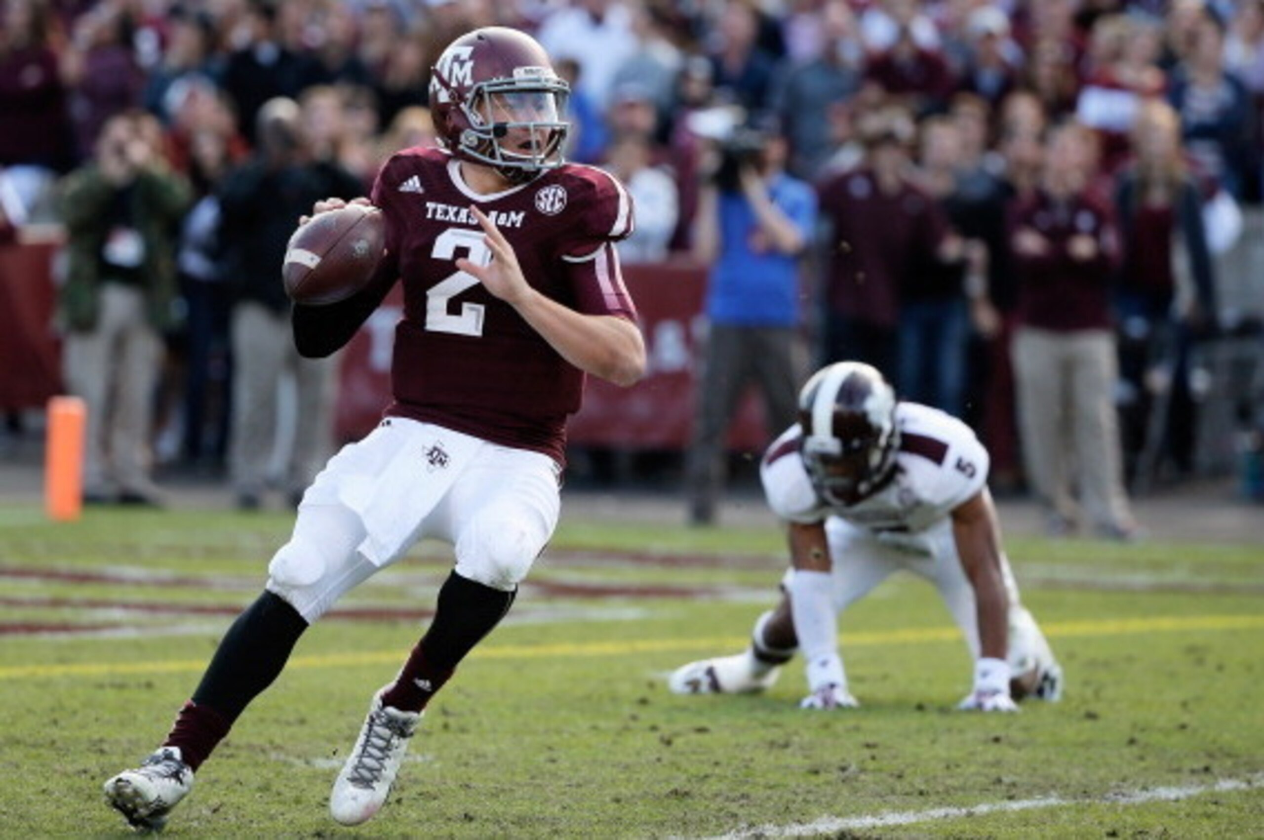 COLLEGE STATION, TX - NOVEMBER 09:  Johnny Manziel #2 of the Texas A&M Aggies drops back to pass in the first half during the game against the Mississippi State Bulldogs at Kyle Field on November 9, 2013 in College Station, Texas.  (Photo by Scott Hallera