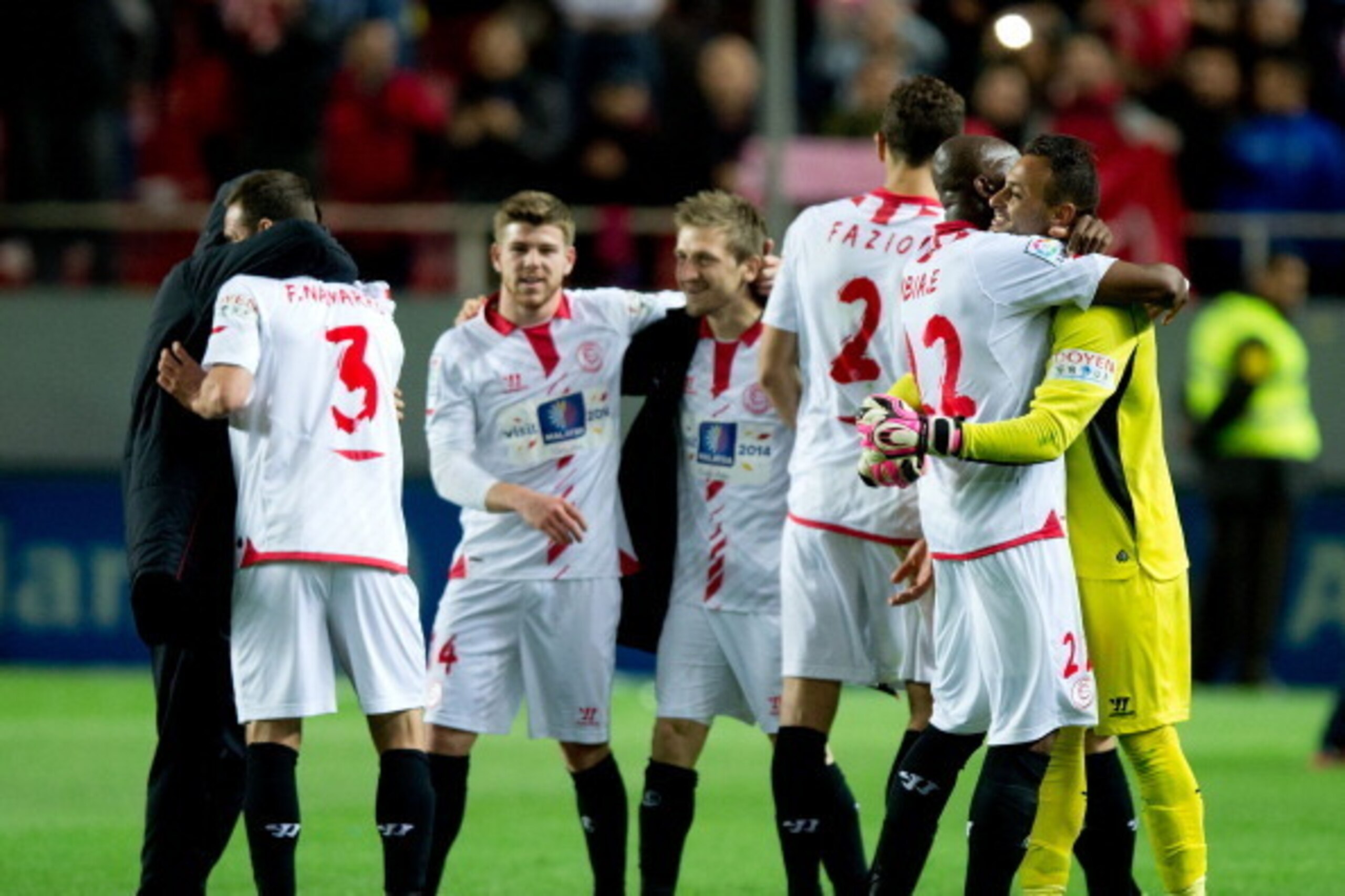 SEVILLE, SPAIN - MARCH 26:  Goalkeeper Antonio Alberto Bastos alias Beto of Sevilla FC celebrates his team's victory with his teammates after the La Liga match between Sevilla FC and Real Madrid CF at Estadio Ramon Sanchez Pizjuan on March 26, 2014 in Sev