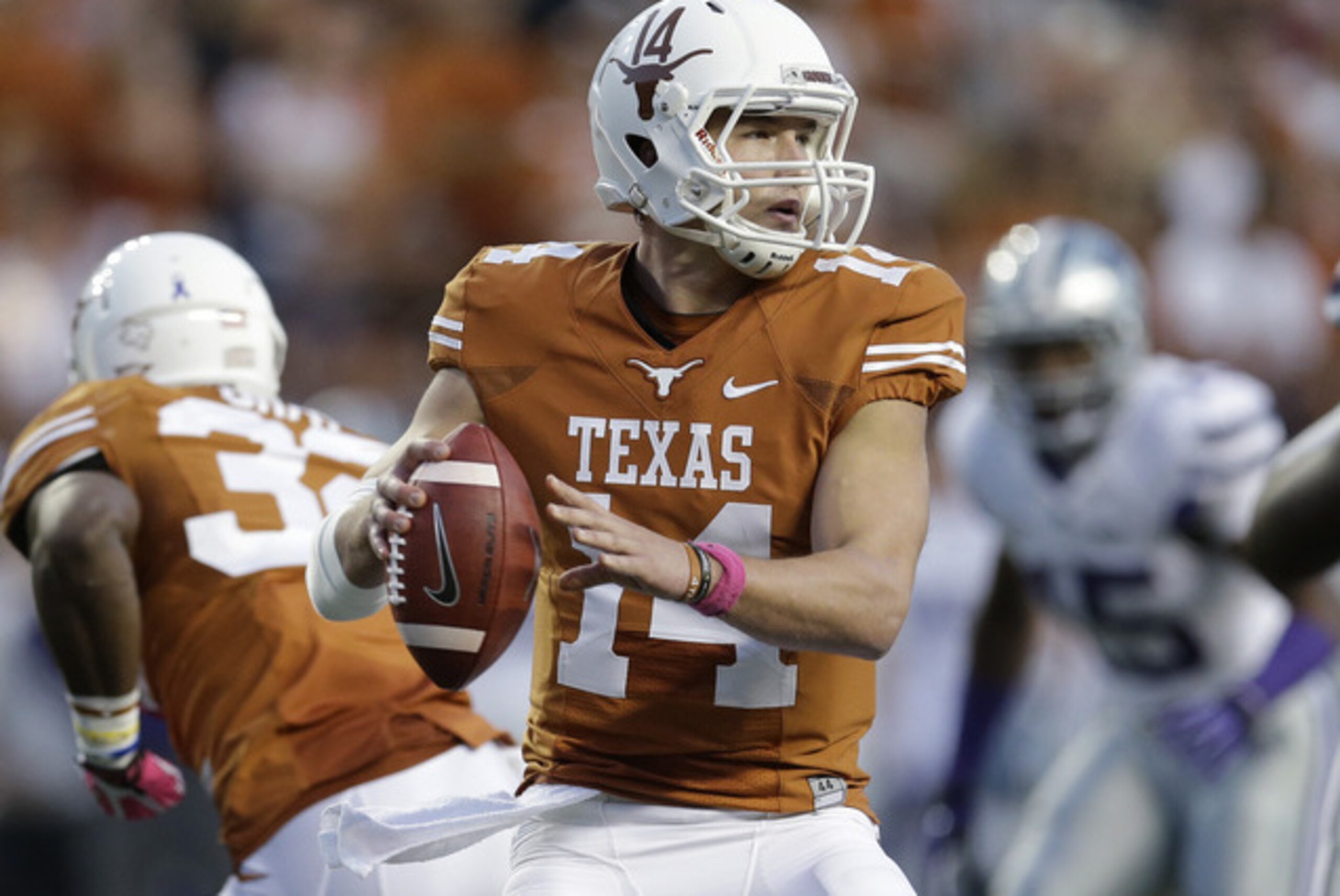 Texas quarterback David Ash battled injuries throughout the 2013 season.