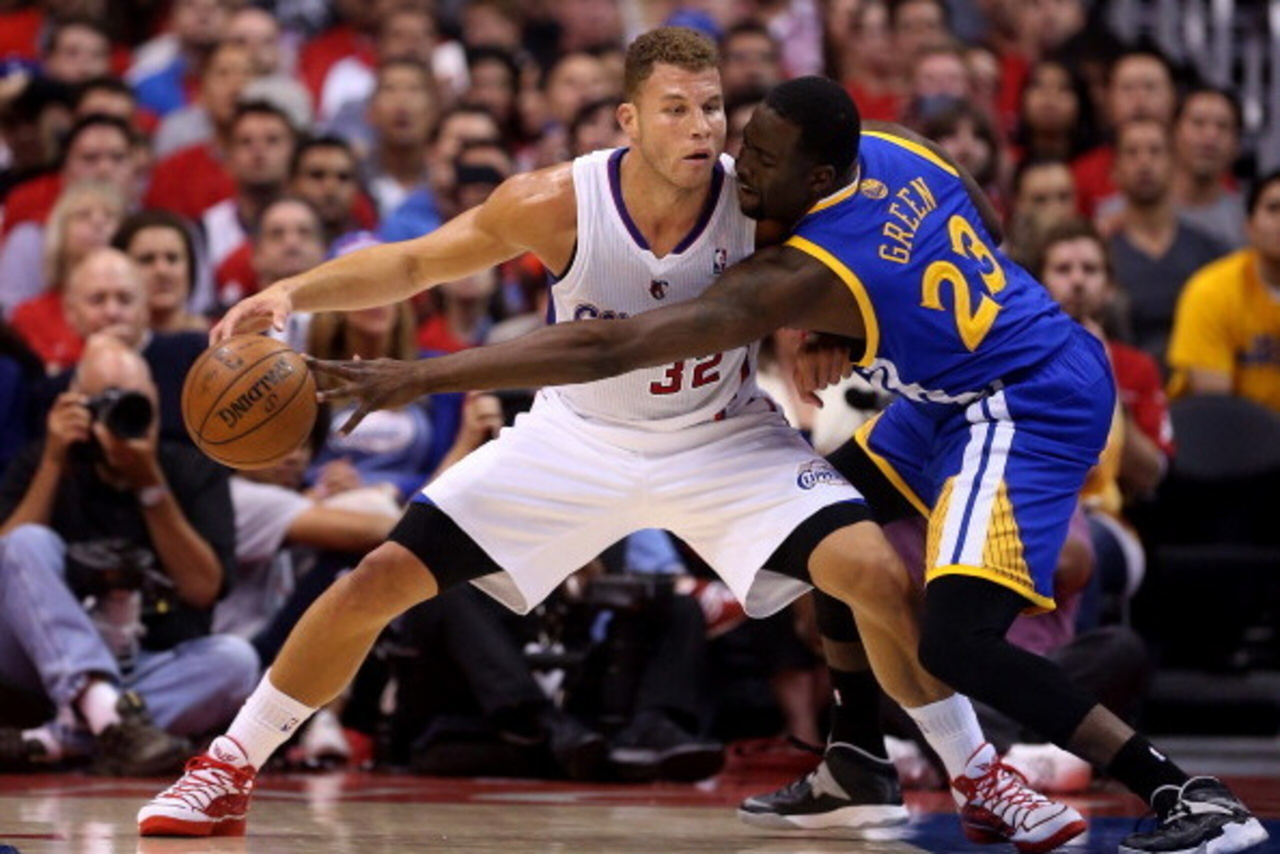 LOS ANGELES, CA - APRIL 21: Blake Griffin #32 of the Los Angeles Clippers controls the ball against Draymond Green #23 of the Golden State Warriors in Game Two of the Western Conference Quarterfinals during the 2014 NBA Playoffs at Staples Center on April