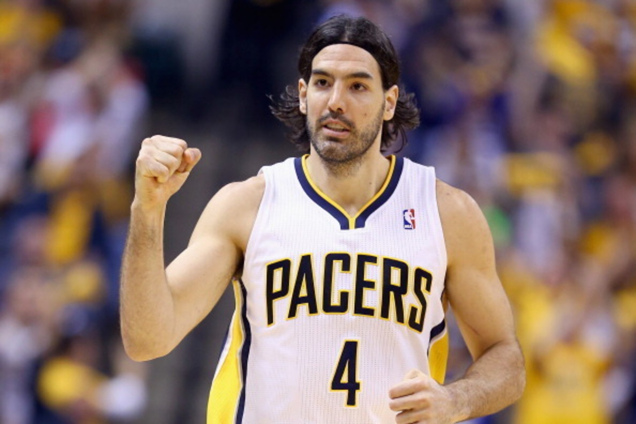INDIANAPOLIS, IN - APRIL 22:  Luis Scola #4 of the Indiana Pacers celebrates in the 101-85 win over the Atlanta Hawks in Game 2 of the Eastern Conference Quarterfinals during the 2014 NBA Playoffs at Bankers Life Fieldhouse on April 22, 2014 in Indianapol
