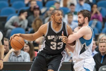 Apr 8, 2014; Minneapolis, MN, USA; San Antonio Spurs forward Boris Diaw (33) dribbles against Minnesota Timberwolves forward Kevin Love (42) at Target Center. Mandatory Credit: Brad Rempel-USA TODAY Sports Apr 8, 2014; Minneapolis, MN, USA; San Antonio Spurs forward Boris Diaw (33) dribbles against Minnesota Timberwolves forward Kevin Love (42) at Target Center. Mandatory Credit: Brad Rempel-USA TODAY Sports