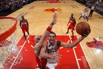 CHICAGO, IL - APRIL 22: Joakim Noah #13 of the Chicago Bulls goes to the basket against the Washington Wizards in Game 2 of the Eastern Conference Quarterfinals on April 22, 2014 at the United Center in Chicago, Illinois. NOTE TO USER: User expressly ackn