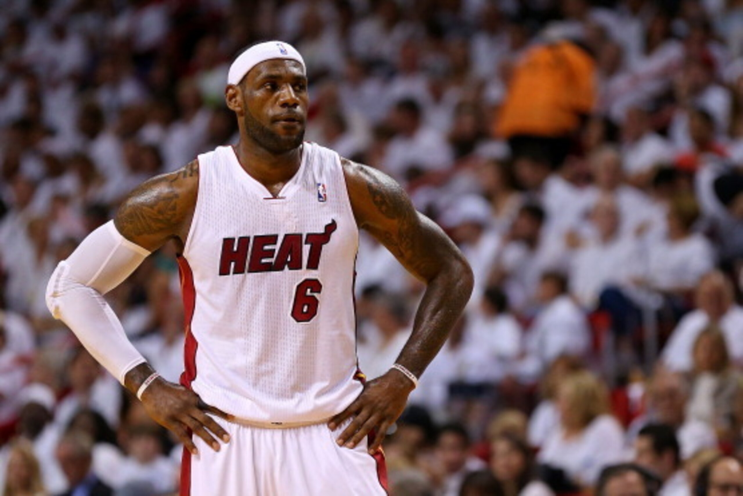 MIAMI, FL - APRIL 20: LeBron James #6 of the Miami Heat looks on during Game 1 of the Eastern Conference Quarterfinals of the 2014 NBA Playoffs against the Charlotte Bobcats at American Airlines Arena on April 20, 2014 in Miami, Florida. NOTE TO USER: Use