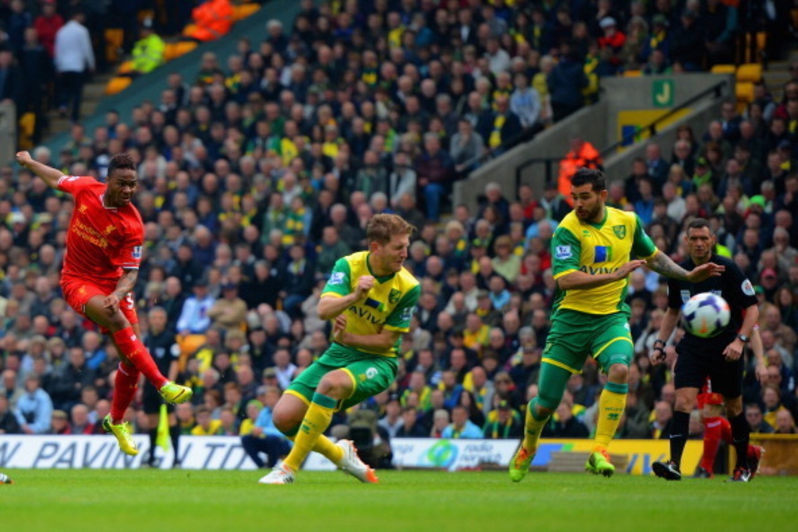 NORWICH, ENGLAND - APRIL 20: Raheem Sterling of Liverpool scores the opening goal during the Barclays Premier League match between Norwich City and Liverpool at Carrow Road on April 20, 2014 in Norwich, England. (Photo by Michael Regan/Getty Images) NORWICH, ENGLAND - APRIL 20: Raheem Sterling of Liverpool scores the opening goal during the Barclays Premier League match between Norwich City and Liverpool at Carrow Road on April 20, 2014 in Norwich, England. (Photo by Michael Regan/Getty Images)