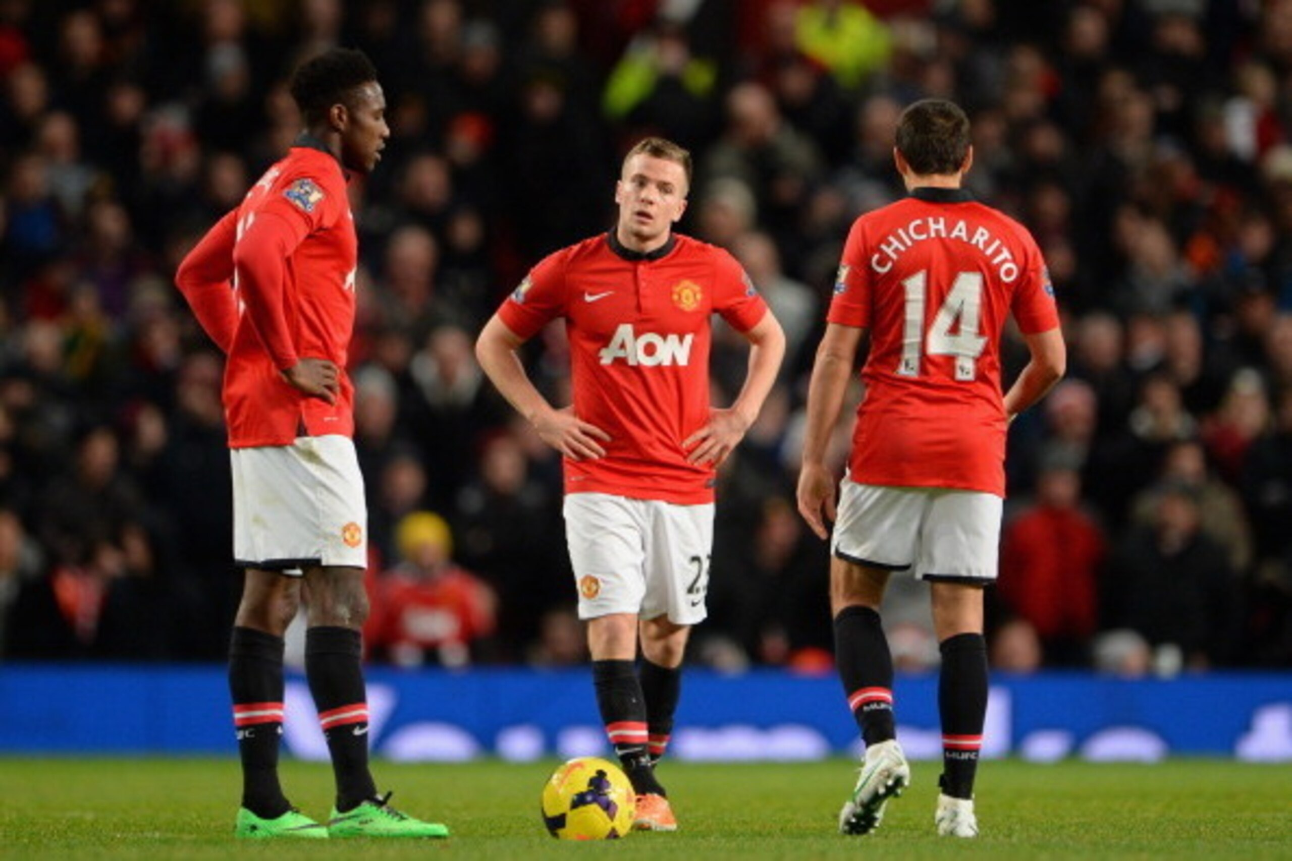 MANCHESTER, ENGLAND - JANUARY 01:  Tom Cleverley of Manchester United and his team-mate Danny Welbeck (l) react after conceding a second goal during the Barclays Premier League match between Manchester United and Tottenham Hotspur at Old Trafford on Janua