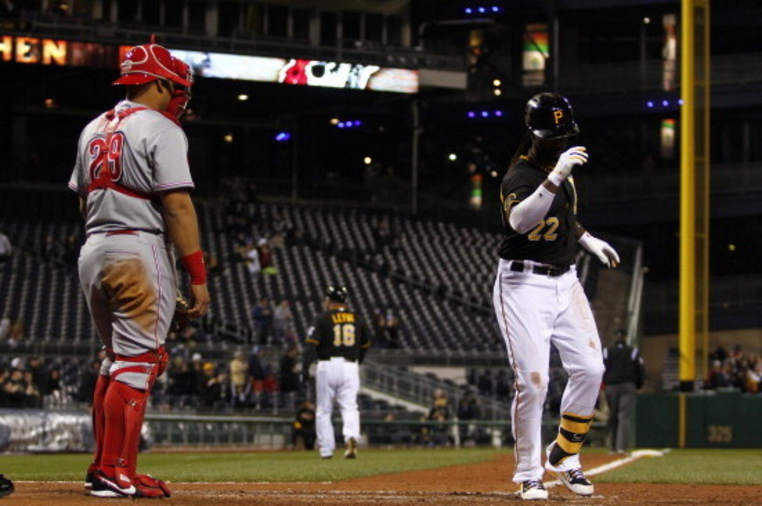 PITTSBURGH, PA - APRIL 22:  Andrew McCutchen #22 of the Pittsburgh Pirates celebrates after hitting a solo home run in the ninth inning against the Cincinnati Reds during the game at PNC Park April 22, 2014 in Pittsburgh, Pennsylvania.  (Photo by Justin K