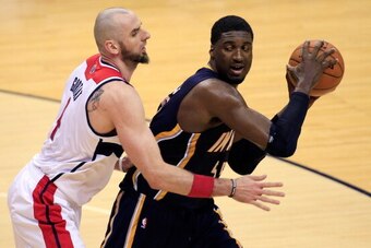 WASHINGTON, DC - MARCH 28: Roy Hibbert #55 of the Indiana Pacers tries to pass the ball around Marcin Gortat #4 of the Washington Wizards during the second half of the Wizards 91-78 win at Verizon Center on March 28, 2014 in Washington, DC. NOTE TO USER: WASHINGTON, DC - MARCH 28: Roy Hibbert #55 of the Indiana Pacers tries to pass the ball around Marcin Gortat #4 of the Washington Wizards during the second half of the Wizards 91-78 win at Verizon Center on March 28, 2014 in Washington, DC. NOTE TO USER: