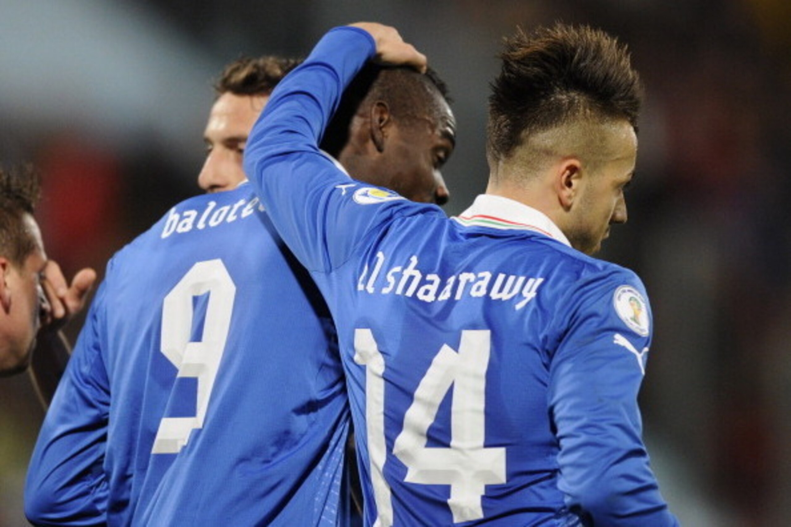 MALTA, MALTA - MARCH 26:  Mario Balotelli of Italy #9 celebrates scoring his team's second goal with team-mate Stephan El Shaarawy during the FIFA 2014 World Cup qualifier match between Malta and Italy at Ta Qali Stadium on March 26, 2013 in Malta, Malta.