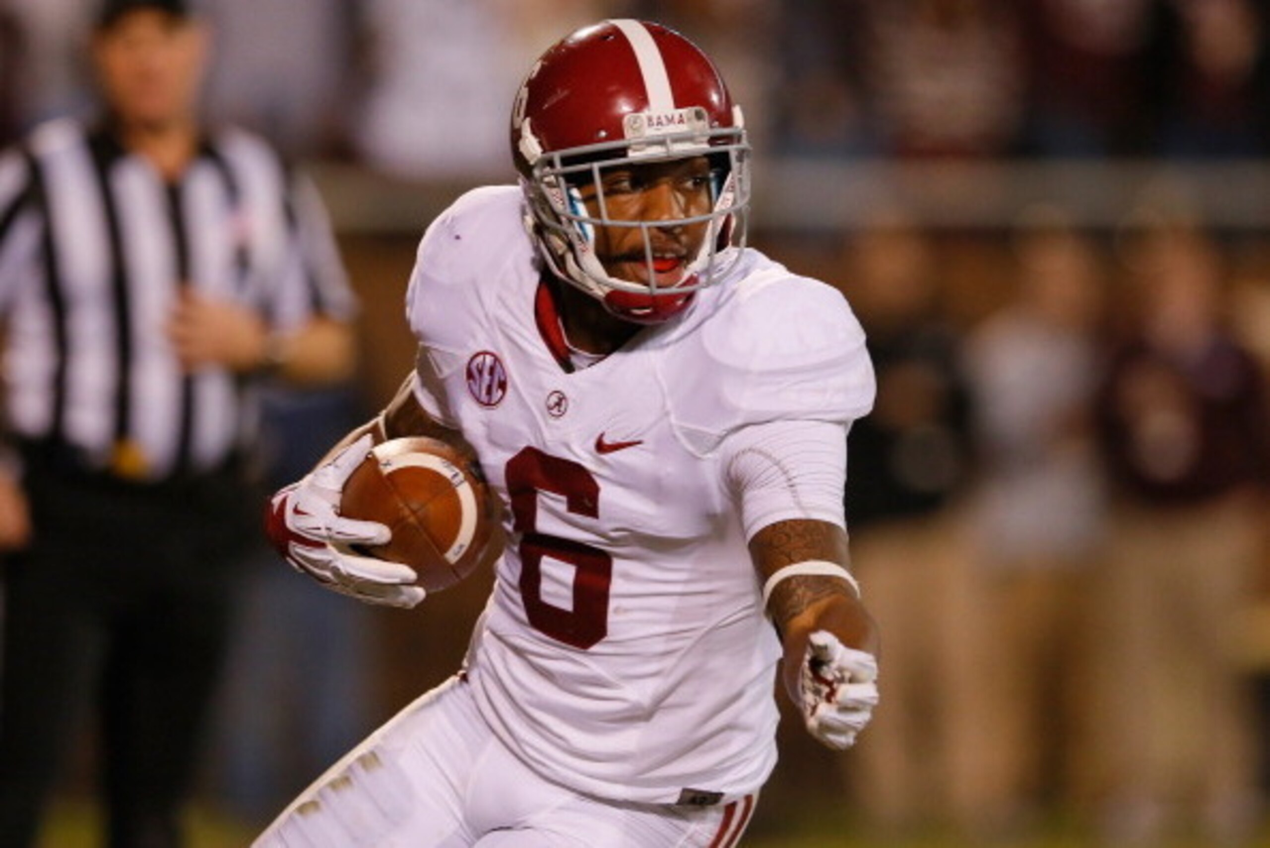 STARKVILLE, MS - NOVEMBER 16:  Ha Ha Clinton-Dix #6 of the Alabama Crimson Tide intercepts a touchdown reception intended for Jameon Lewis #4 of the Mississippi State Bulldogs at Davis Wade Stadium on November 16, 2013 in Starkville, Mississippi.  (Photo 