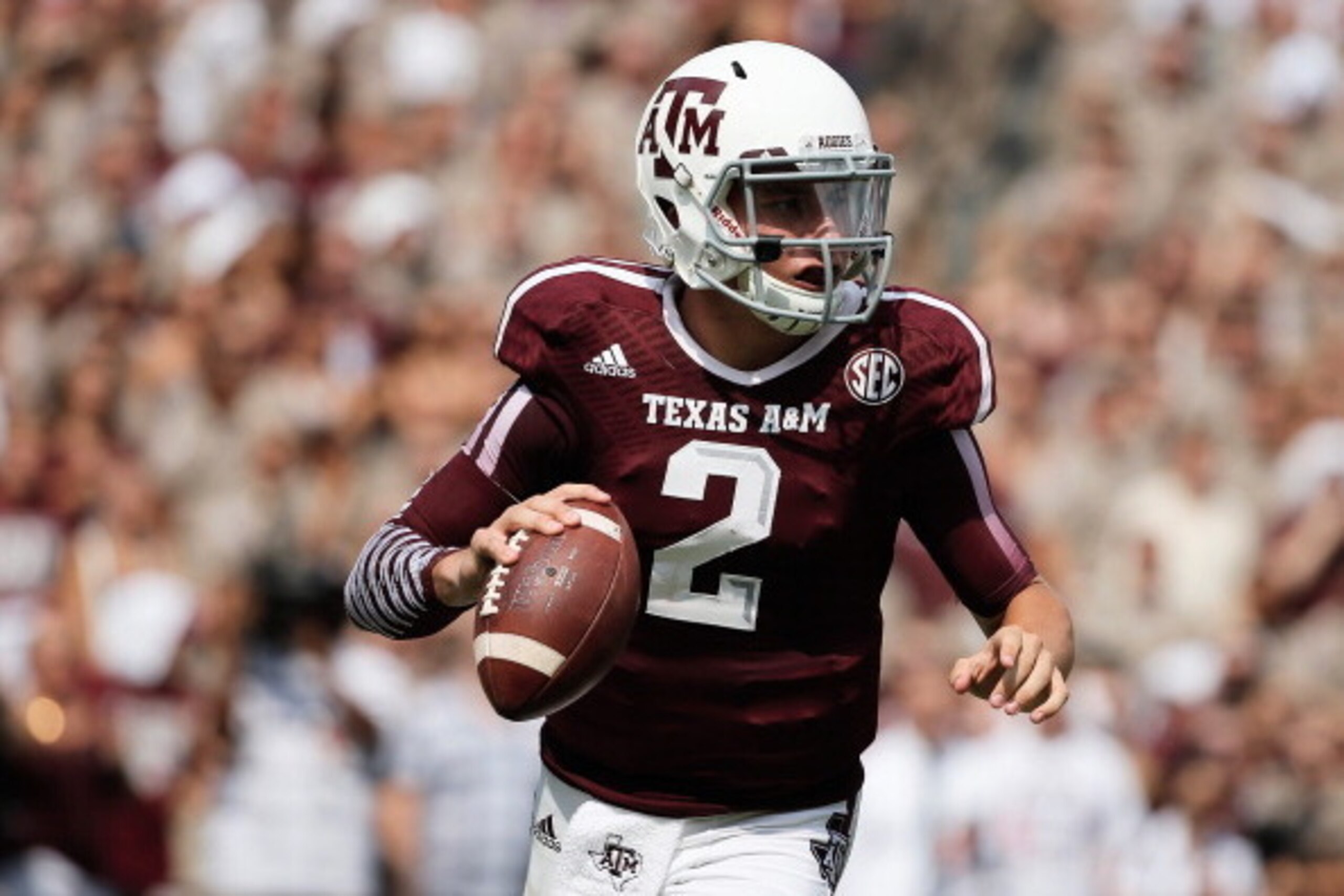 COLLEGE STATION, TX - SEPTEMBER 14: Johnny Manziel #2 of Texas A&M Aggies drops back to pass during the game against the Alabama Crimson Tide at Kyle Field on September 14, 2013 in College Station, Texas. (Photo by Scott Halleran/Getty Images) COLLEGE STATION, TX - SEPTEMBER 14: Johnny Manziel #2 of Texas A&M Aggies drops back to pass during the game against the Alabama Crimson Tide at Kyle Field on September 14, 2013 in College Station, Texas. (Photo by Scott Halleran/Getty Images)
