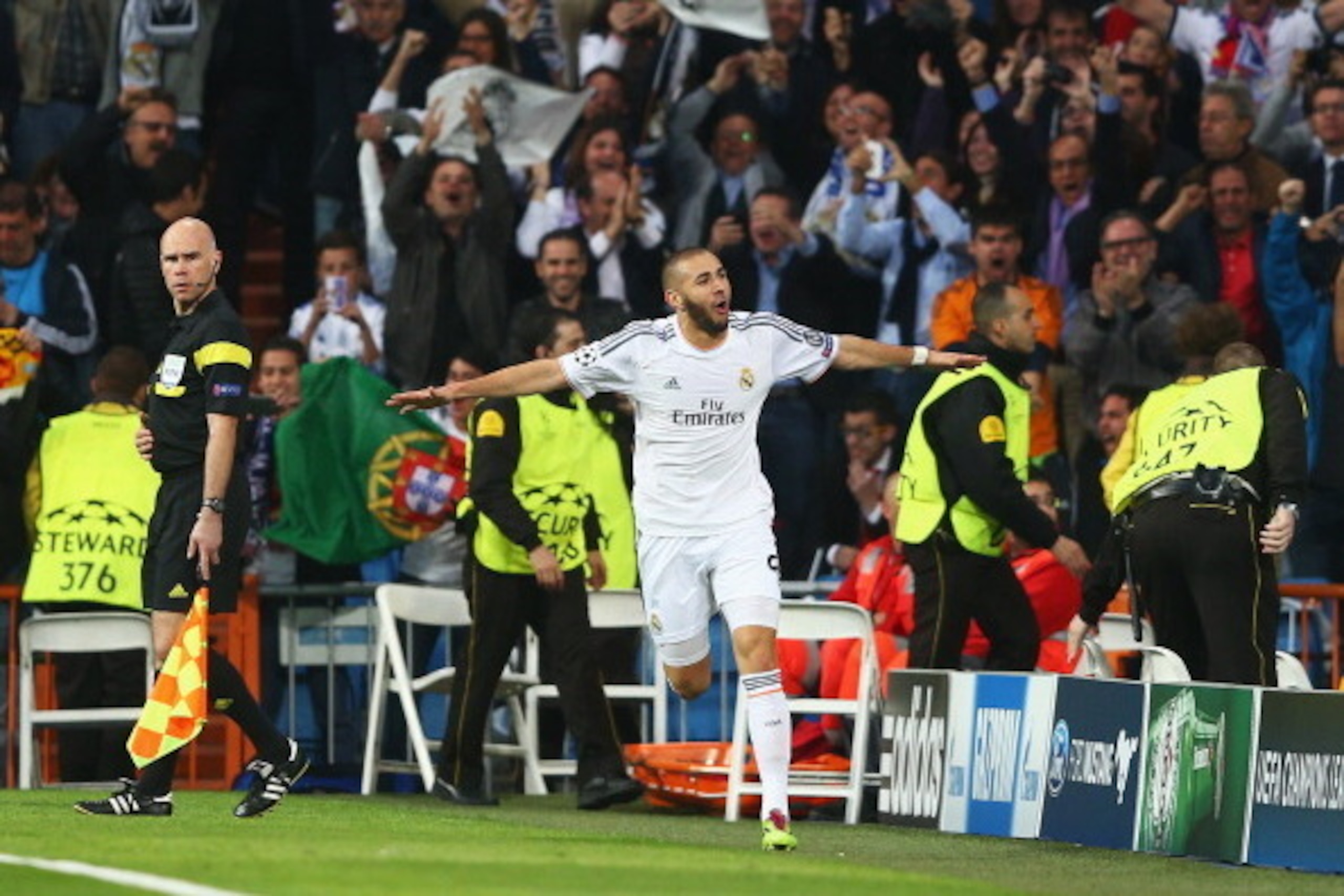 MADRID, SPAIN - APRIL 23:  Karim Benzema of Real Madrid celebrates scoring the opening goal during the UEFA Champions League semi-final first leg match between Real Madrid and FC Bayern Muenchen at the Estadio Santiago Bernabeu on April 23, 2014 in Madrid