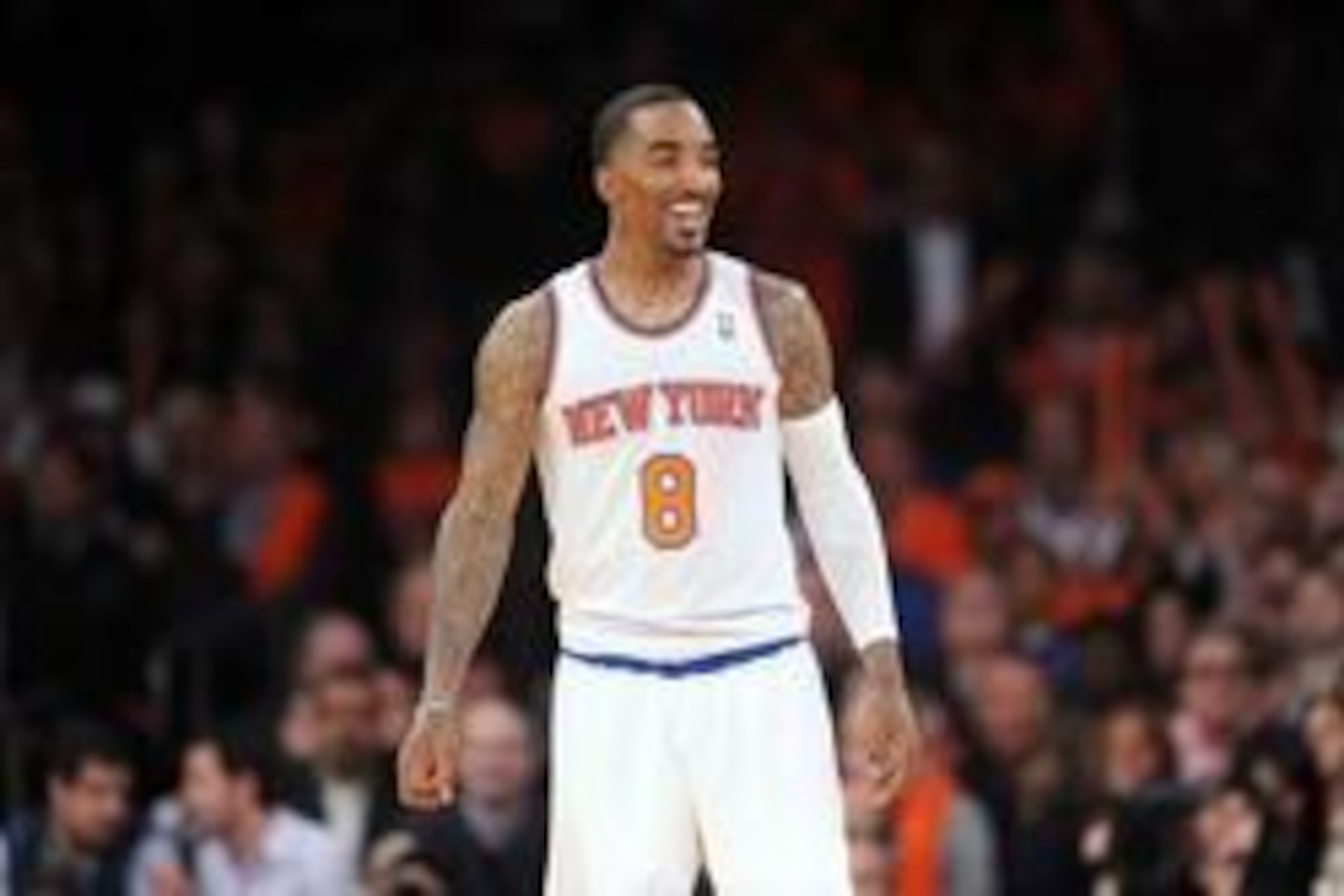 Apr 2, 2014; New York, NY, USA; New York Knicks guard J.R. Smith (8) looks on against the Brooklyn Nets during the second half at Madison Square Garden. The New York Knicks won 110-81. Mandatory Credit: Joe Camporeale-USA TODAY Sports