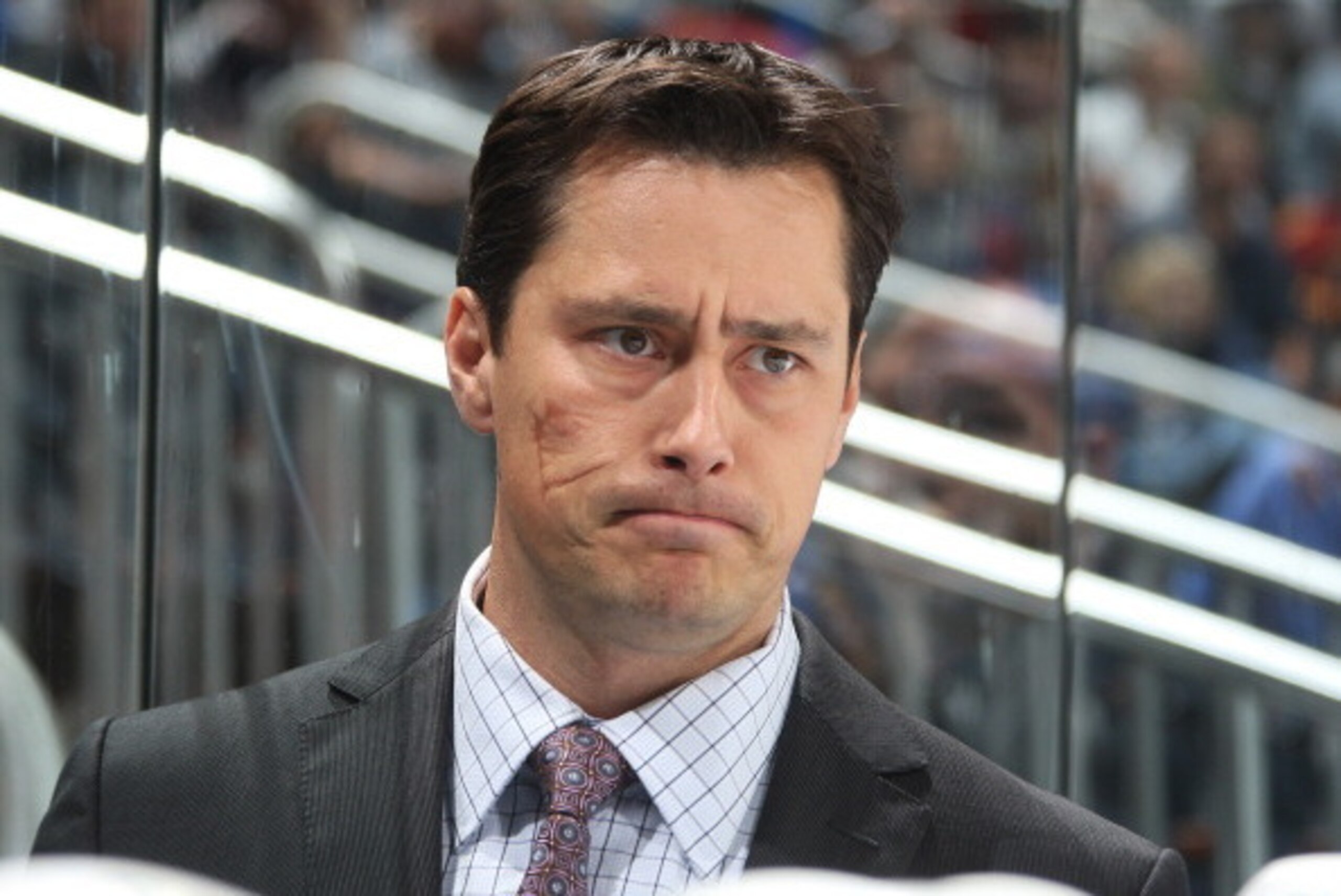 ATLANTA - OCTOBER 22: Head Coach Guy Boucher of the Tampa Bay Lightning watches the action against the Atlanta Thrashers at Philips Arena on October 22, 2010 in Atlanta, Georgia. (Photo by Scott Cunningham/NHLI via Getty Images)