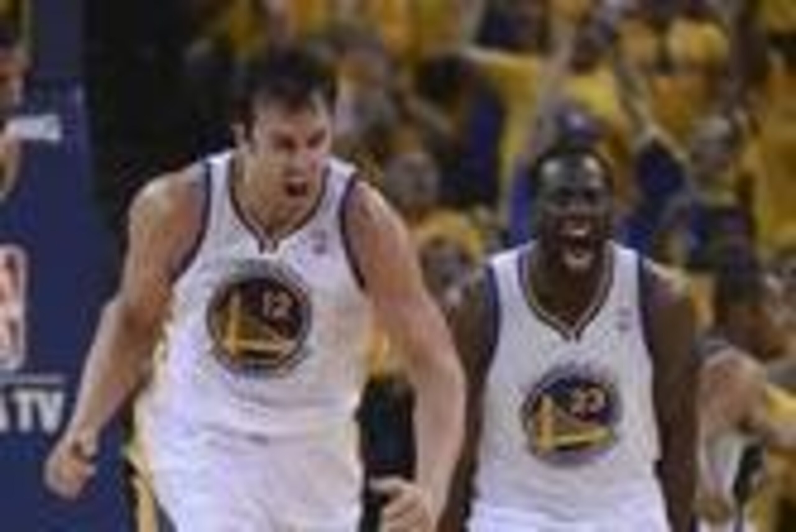 May 10, 2013; Oakland, CA, USA; Golden State Warriors center Andrew Bogut (12) and small forward Draymond Green (23) celebrate after a play against the San Antonio Spurs during the first quarter of game three of the second round of the 2013 NBA Playoffs a