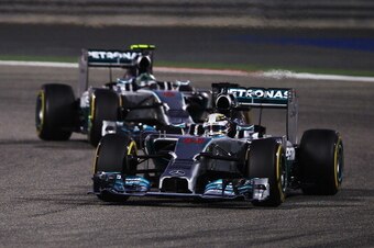 SAKHIR, BAHRAIN - APRIL 06:  Lewis Hamilton of Great Britain and Mercedes GP leads from team mate Nico Rosberg of Germany and Mercedes GP at the start of the Bahrain Formula One Grand Prix at the Bahrain International Circuit on April 6, 2014 in Sakhir, B