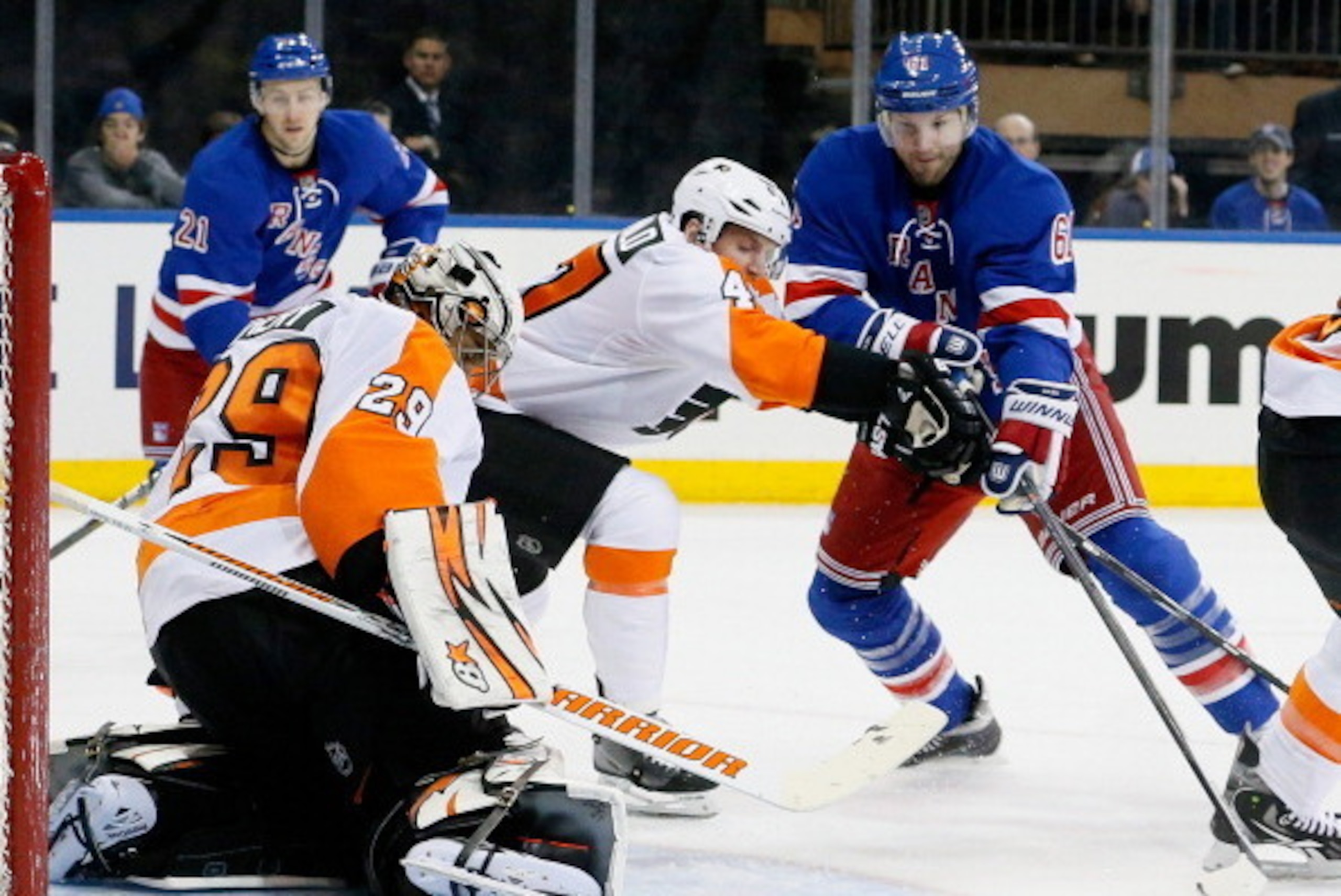 NEW YORK, NY - APRIL 20:  Rick Nash #61 of the New York Rangers shoots the puck as goalie Ray Emery #29 of the Philadelphia Flyers makes the stop in Game Two of the First Round of the 2014 NHL Stanley Cup Playoffs at Madison Square Garden on April 20, 201