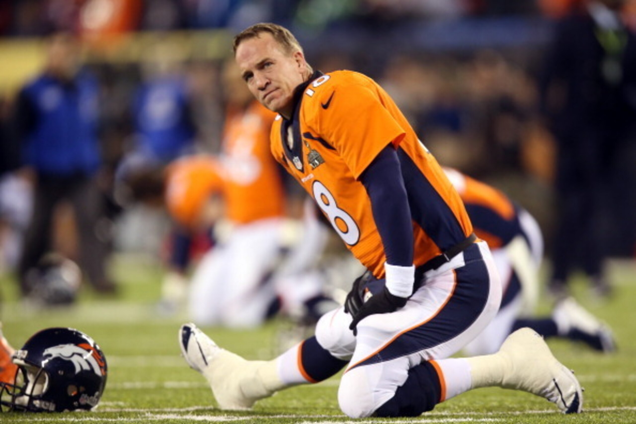 EAST RUTHERFORD, NJ - FEBRUARY 02:  Quarterback Peyton Manning #18 of the Denver Broncos warms up prior to Super Bowl XLVIII against the Seattle Seahawks at MetLife Stadium on February 2, 2014 in East Rutherford, New Jersey.  (Photo by Jeff Gross/Getty Im