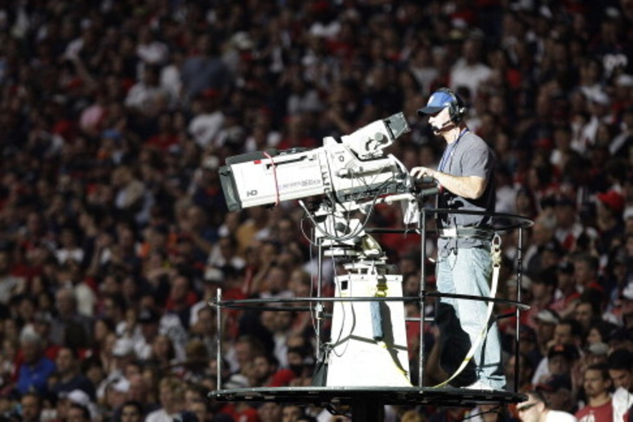 HOUSTON, TX - JANUARY 7: A TV camera man shoots the game between the Houston Texans and the Cincinnati Bengals during the 2012 AFC Wild Card Playoff game at Reliant Stadium on January 7, 2012 in Houston, Texas. Texas won 31 to 10. (Photo by Thomas B. Shea