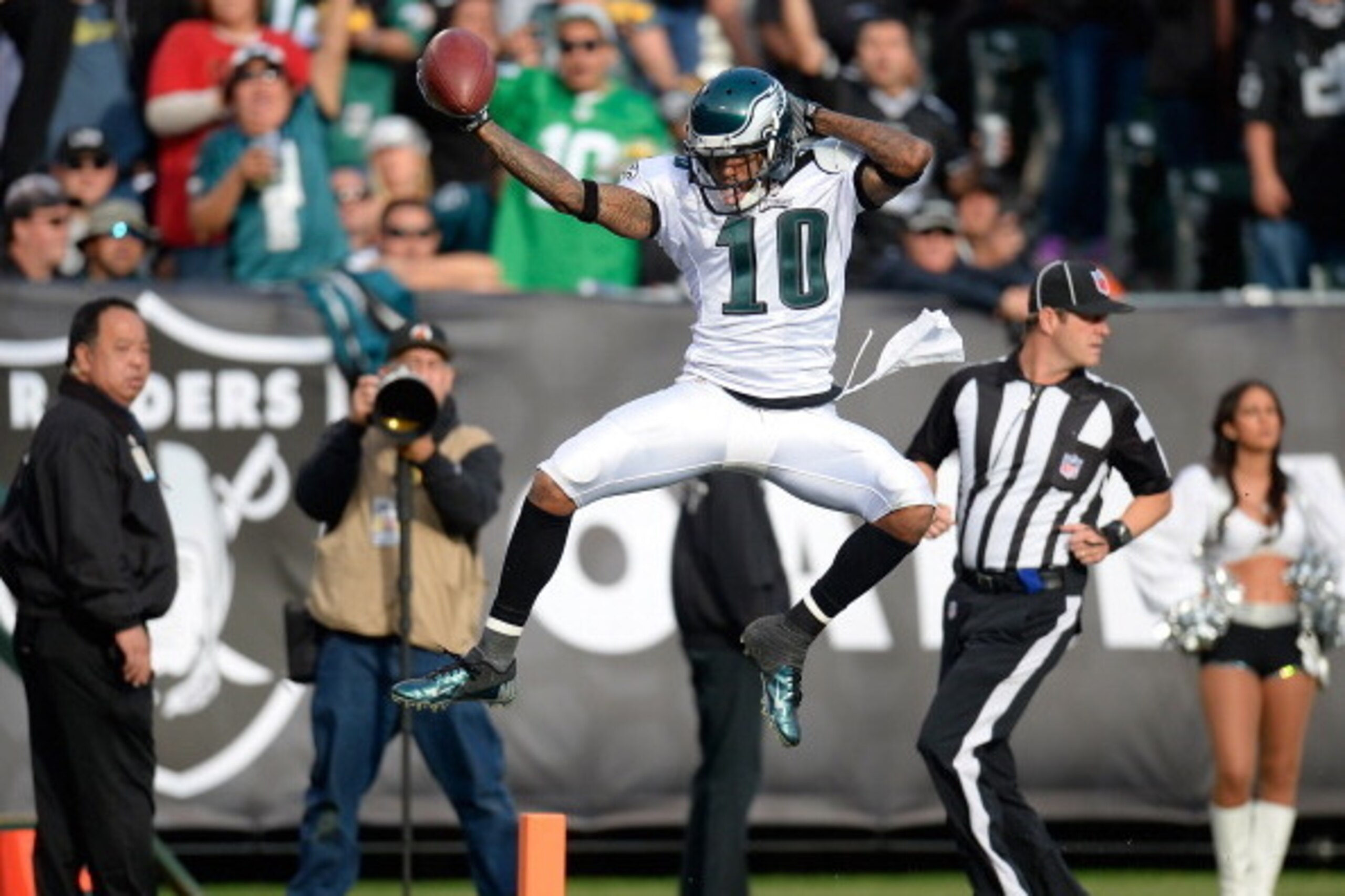 OAKLAND, CA - NOVEMBER 03:  DeSean Jackson #10 of the Philadelphia Eagles leaps over the goal line scoring on a forty six yard touchdown pass against the Oakland Raiders during the third quarter at O.co Coliseum on November 3, 2013 in Oakland, California.
