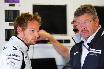 SPA FRANCORCHAMPS, BELGIUM - AUGUST 28:  Jenson Button (L) of Great Britain and Brawn GP is seen with his Team Principal Ross Brawn (R) as he prepares to drive during practice for the Belgian Grand Prix at the Circuit of Spa Francorchamps on August 28, 20