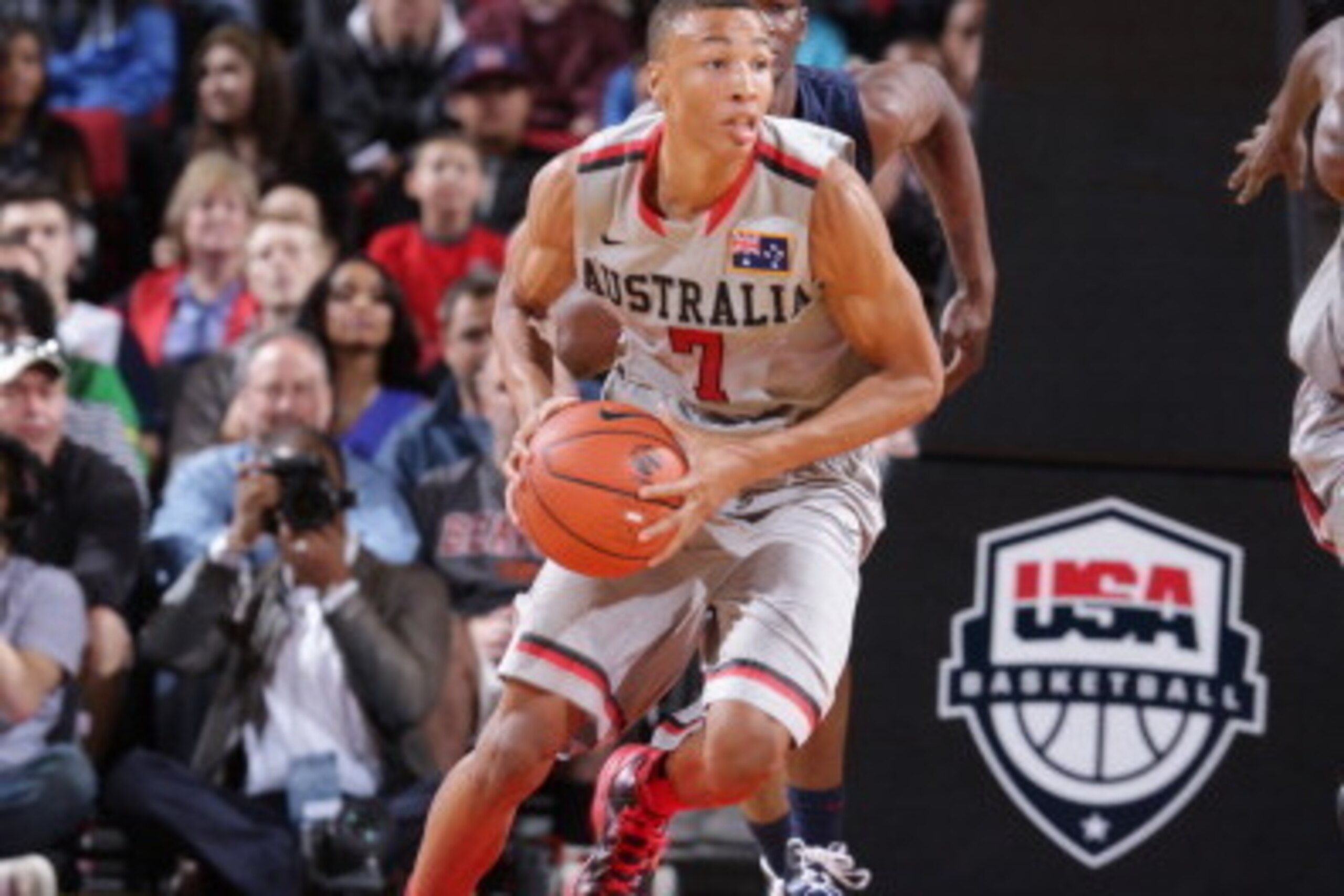 PORTLAND, OR - APRIL 20: Dante Exum #7 on the World Select Team drives against the USA Junior Select Team during the game on April 20, 2013 at the Rose Garden Arena in Portland, Oregon. NOTE TO USER: User expressly acknowledges and agrees that, by downloa
