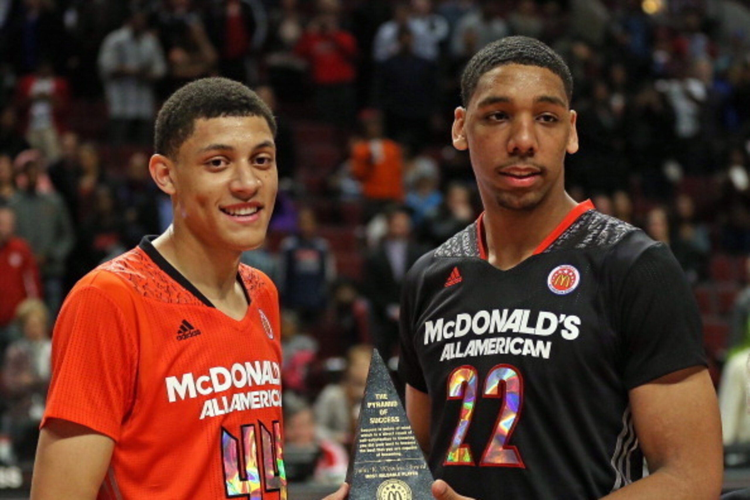 CHICAGO, IL - APRIL 2: Justin Jackson #44 of the East team and Jahlil Okafor #22 of the West team share the MVP torphy after the 2014 McDonald's All American Game at United Center on April 2, 2014 in Chicago, Illinois. The West defeated the East 105-102. 