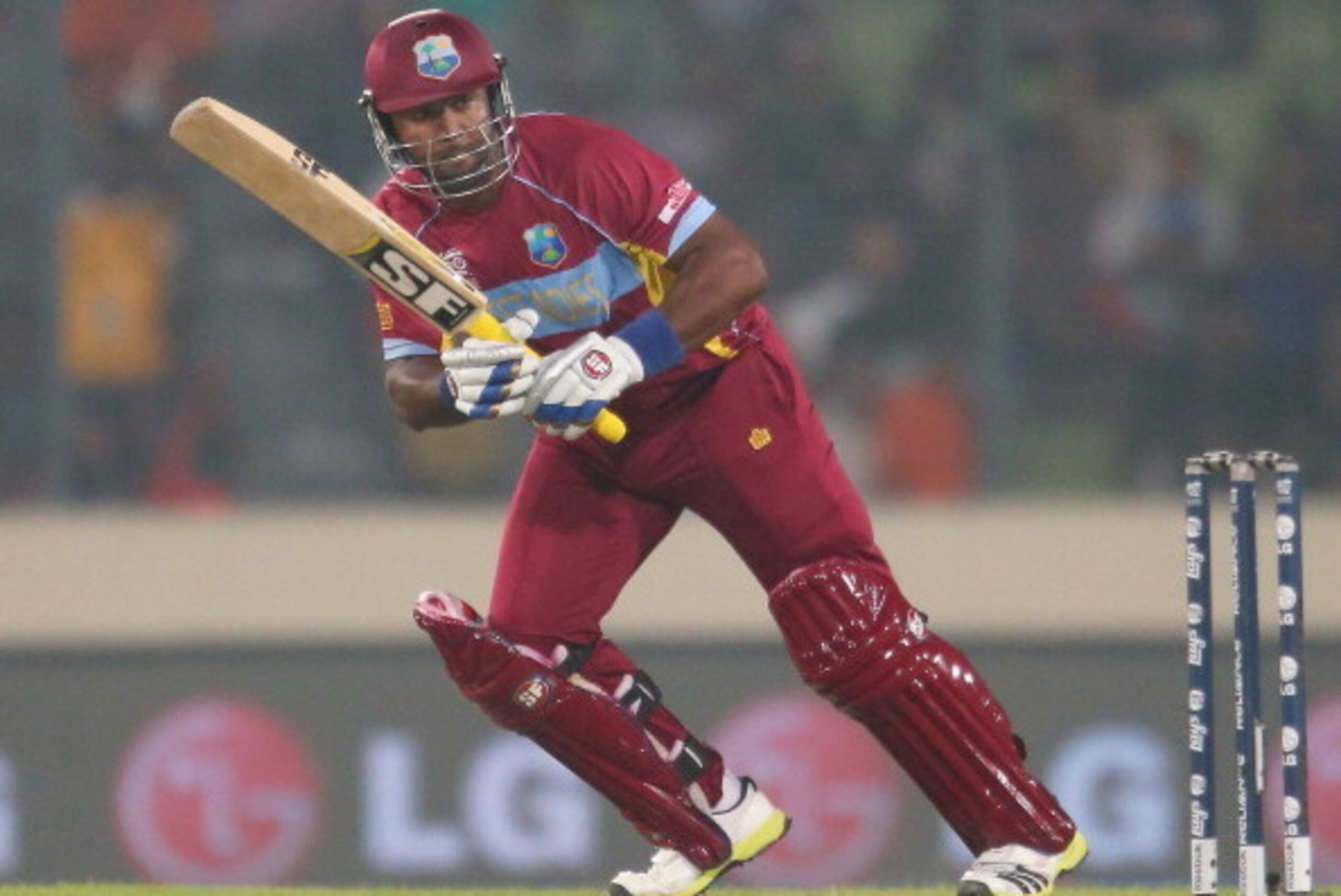 DHAKA, BANGLADESH - MARCH 25:  Dwayne Smith of the West Indies hits a boundary during the ICC World Twenty20 Bangladesh 2014 match between Bangladesh and the West Indies at Sher-e-Bangla Mirpur Stadium on March 25, 2014 in Dhaka, Bangladesh.  (Photo by Sc