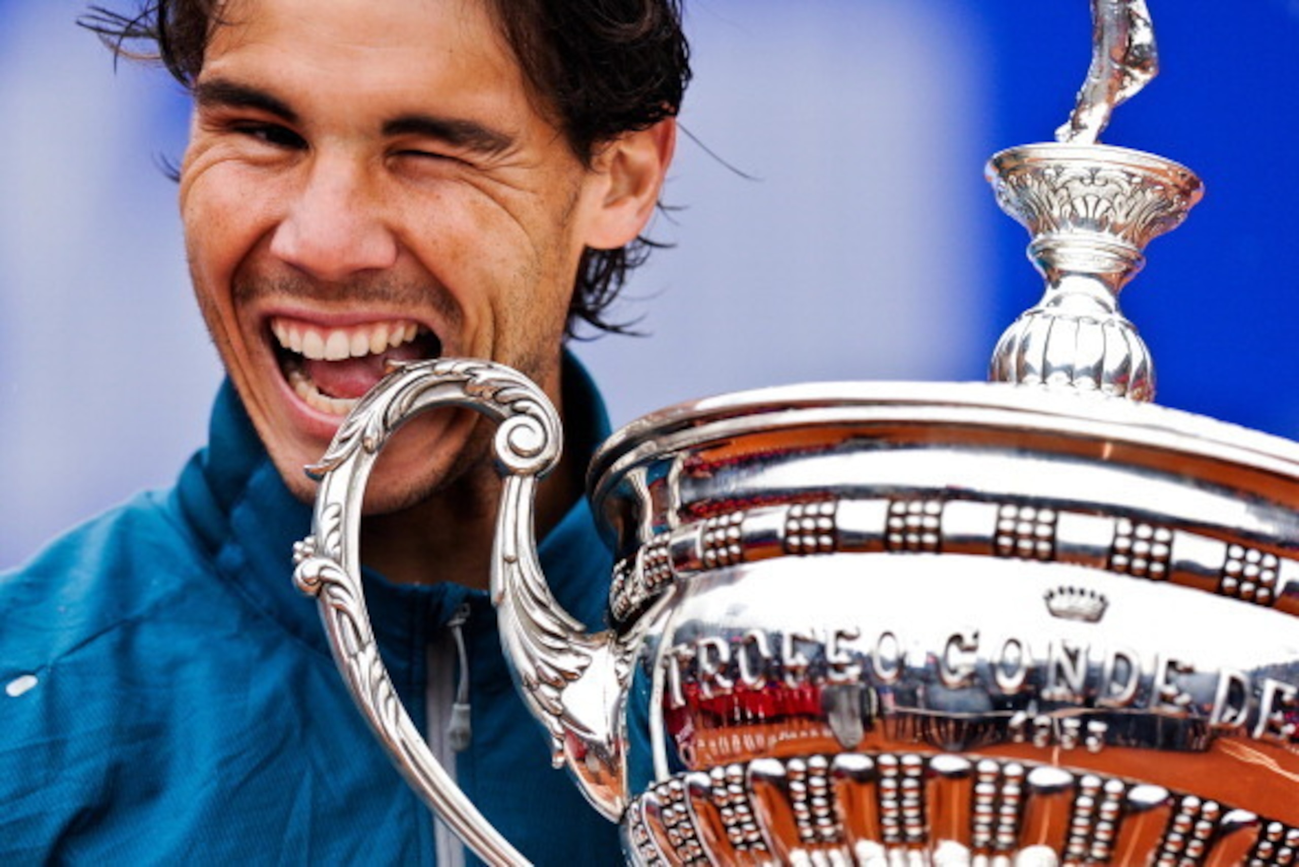 BARCELONA, SPAIN - APRIL 28:  Rafael Nadal of Spain bites the trophy after winning his final match againts Nicolas Almagro of Spain during day seven of the 2013 Barcelona Open Banc Sabadell on April 28, 2013 in Barcelona. Rafael Nadal won 6-4, 6-3.  (Phot