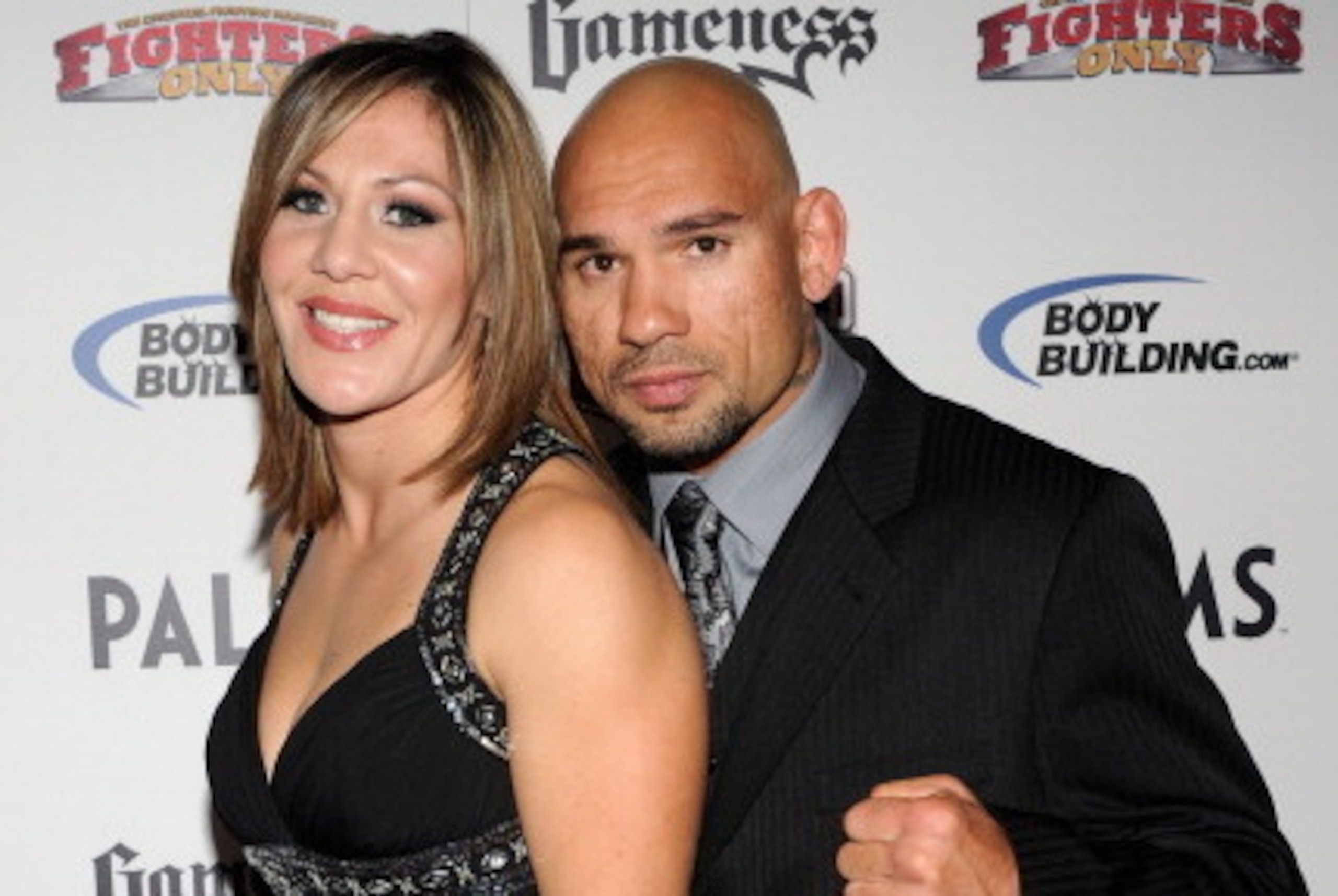 LAS VEGAS, NV - DECEMBER 01:  Mixed martial artist Cristiane Santos (L) and her husband, mixed martial artist Evangelista Santos, arrive at the third annual Fighters Only World Mixed Martial Arts Awards 2010 at the Palms Casino Resort December 1, 2010 in 