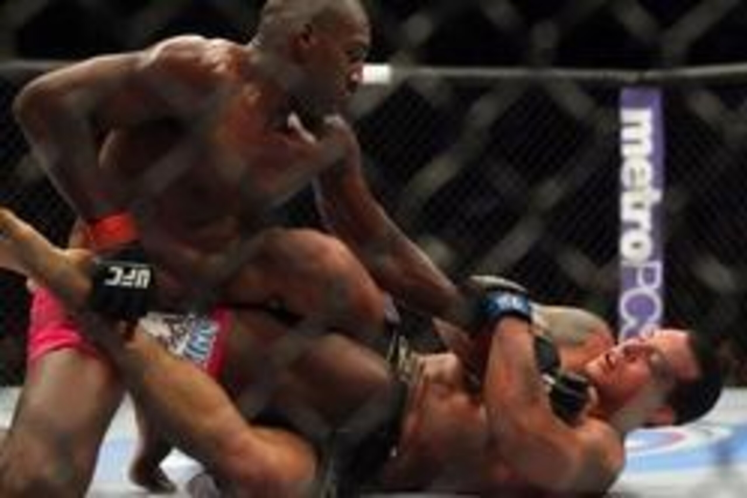 Apr 27, 2013; Newark, NJ, USA; Phil Davis (red shorts) competes against Vinny Magalhaes (black shorts) during UFC 159 at the Prudential Center. Mandatory Credit: Brad Penner-USA TODAY Sports