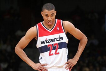 WASHINGTON, DC - DECEMBER 6:  Otto Porter Jr. #22 of the Washington Wizards stands on the court during the game against the Milwaukee Bucks at the Verizon Center on December 6, 2013 in Washington, DC. NOTE TO USER: User expressly acknowledges and agrees t