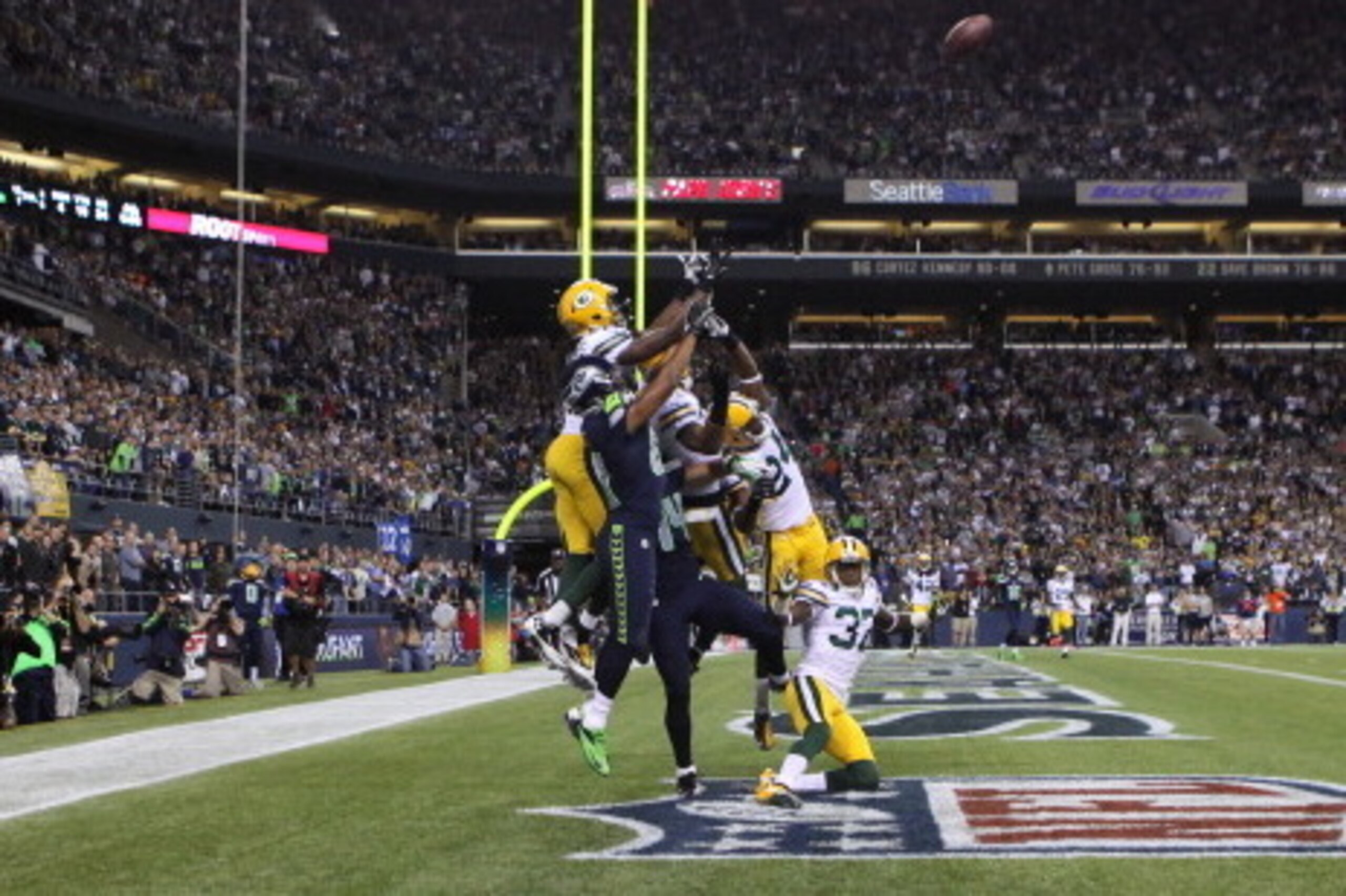 SEATTLE, WA - SEPTEMBER 24:  Wide receiver Golden Tate #81 of the Seattle Seahawks makes a catch in the end zone to defeat the Green Bay Packers on a controversial call by the officials at CenturyLink Field on September 24, 2012 in Seattle, Washington.  (