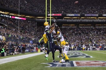 SEATTLE, WA - SEPTEMBER 24: Wide receiver Golden Tate #81 of the Seattle Seahawks makes a catch in the end zone to defeat the Green Bay Packers on a controversial call by the officials at CenturyLink Field on September 24, 2012 in Seattle, Washington. ( SEATTLE, WA - SEPTEMBER 24: Wide receiver Golden Tate #81 of the Seattle Seahawks makes a catch in the end zone to defeat the Green Bay Packers on a controversial call by the officials at CenturyLink Field on September 24, 2012 in Seattle, Washington. (