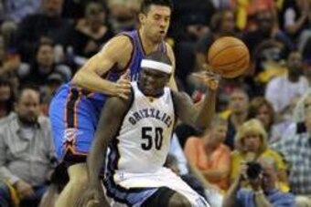 Apr 24, 2014; Memphis, TN, USA; Memphis Grizzlies forward Zach Randolph (50) loses the ball against Oklahoma City Thunder forward Nick Collison (4) in game three of the first round of the 2014 NBA Playoffs at FedExForum. Mandatory Credit: Justin Ford-USA 