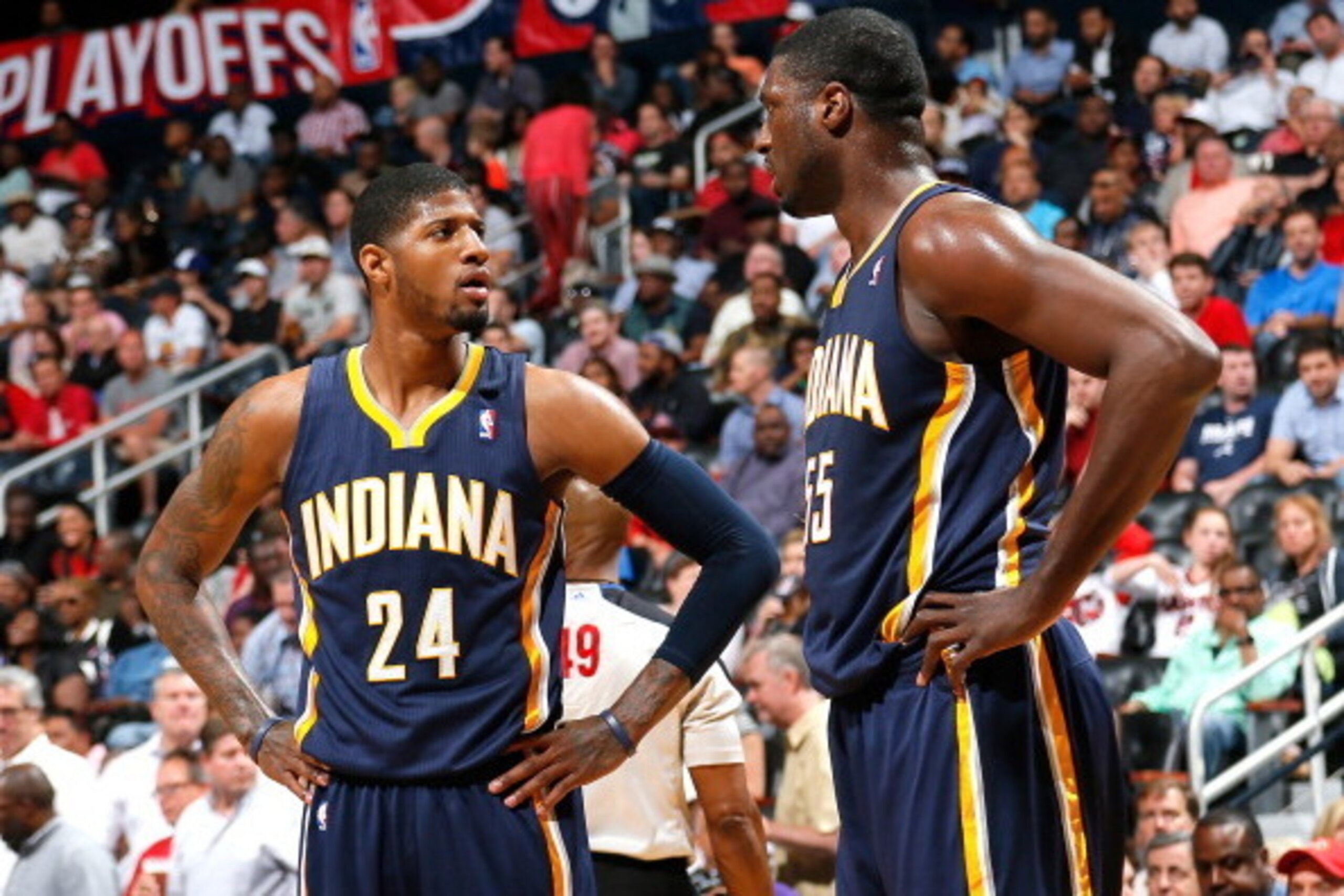 ATLANTA, GA - APRIL 24:  Paul George #24 and Roy Hibbert #55 of the Indiana Pacers react after a foul in Game 3 of the Eastern Conference Quarterfinals during the 2014 NBA Playoffs against the Atlanta Hawks at Philips Arena on April 24, 2014 in Atlanta, G
