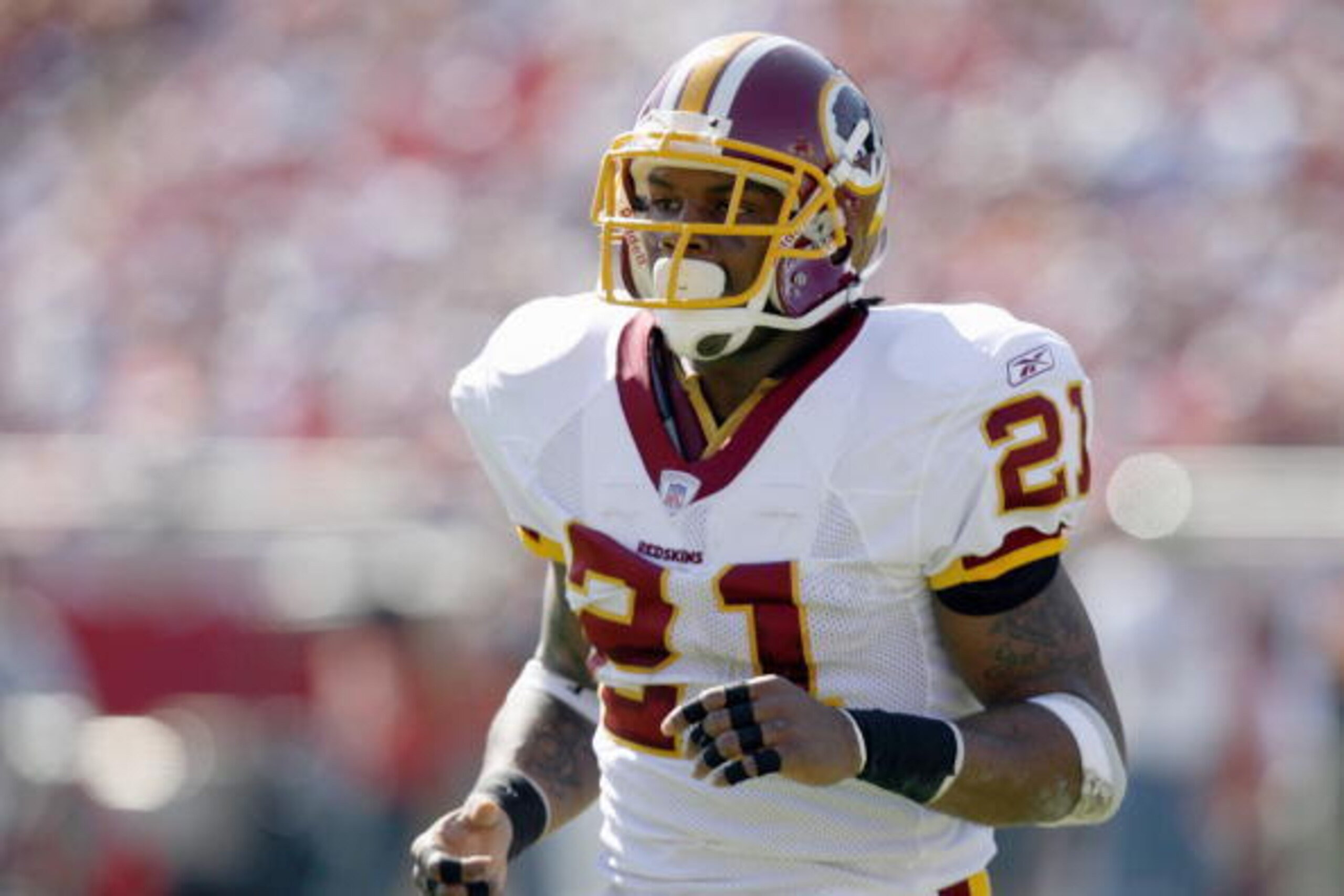 TAMPA - NOVEMBER 19:  Sean Taylor #21 of the Washington Redskins jogs on the field during the game against the Tampa Bay Buccaneers on November 19, 2006 at Raymond James Stadium in Tampa, Florida. (Photo by Matt Stroshane/Getty Images)