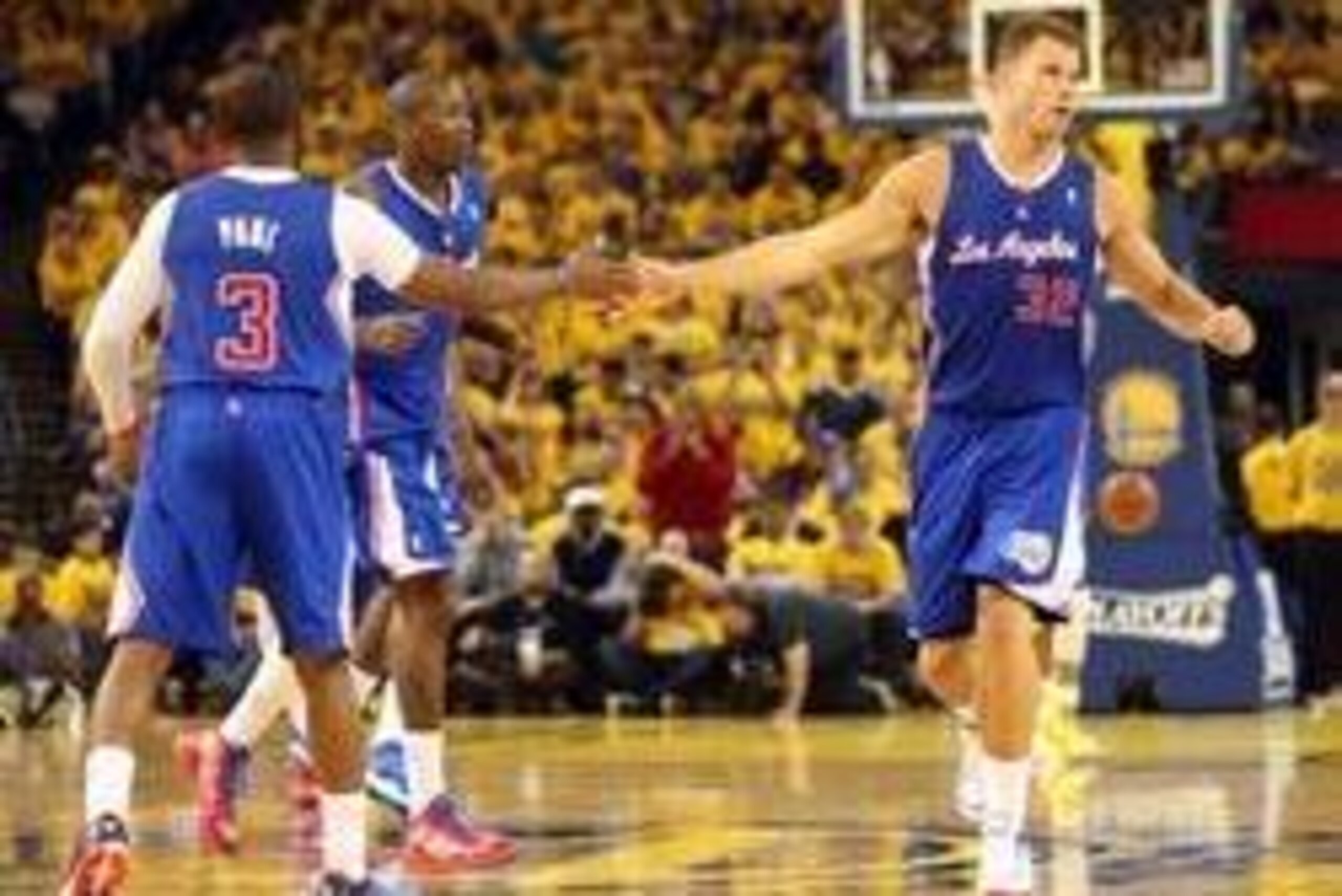 Apr 24, 2014; Oakland, CA, USA; Los Angeles Clippers forward Blake Griffin (32) high fives guard Chris Paul (3) after a play against the Golden State Warriors during the second quarter of game three of the first round of the 2014 NBA Playoffs at Oracle Ar