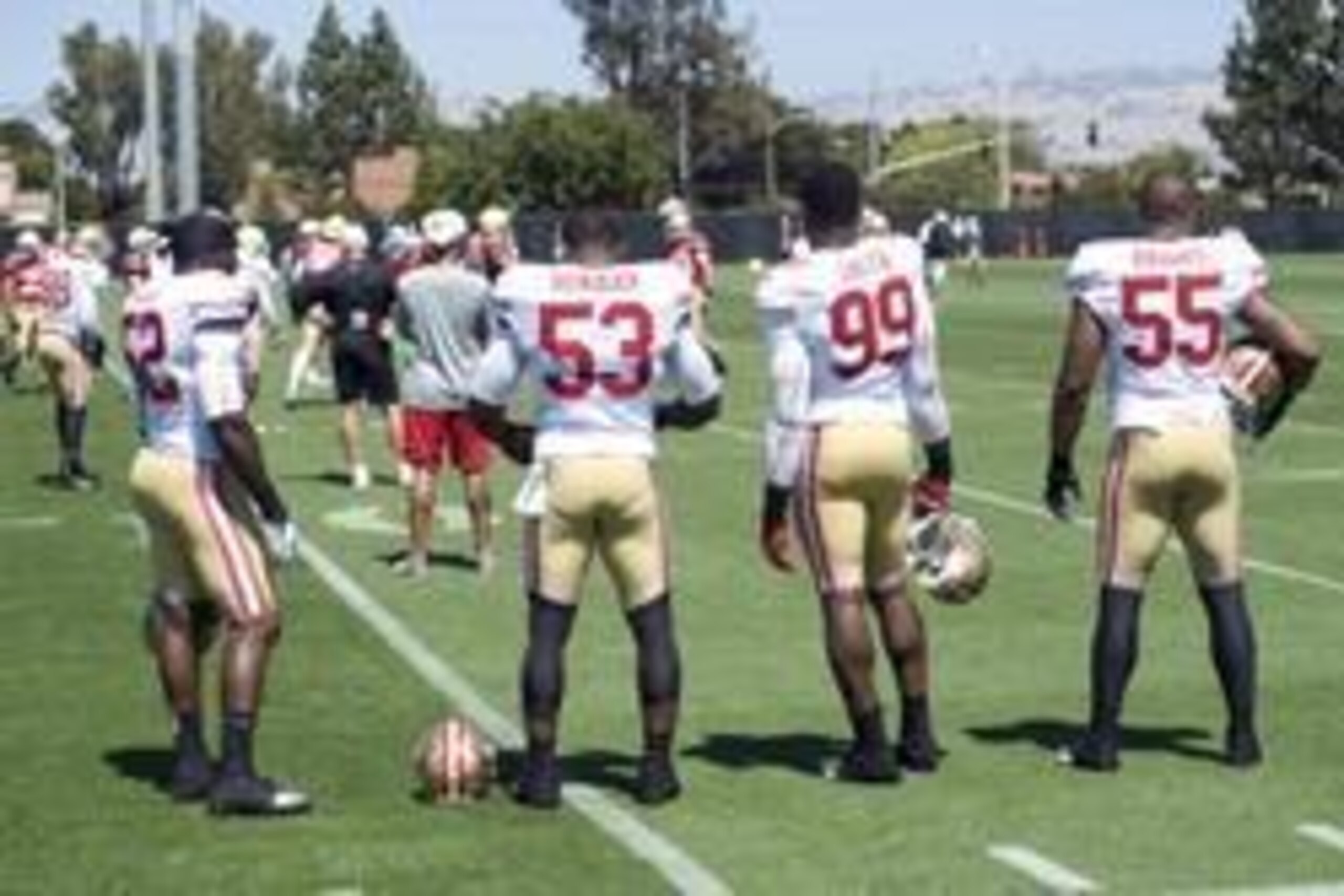 July 29, 2012; Santa Clara, CA, USA; San Francisco 49ers linebackers Patrick Willis (52), and NaVorro Bowman (53), and Aldon Smith (99) and Ahmad Brooks (55) during training camp at the 49ers practice facility.  Mandatory Credit: Ed Szczepanski-USA TODAY