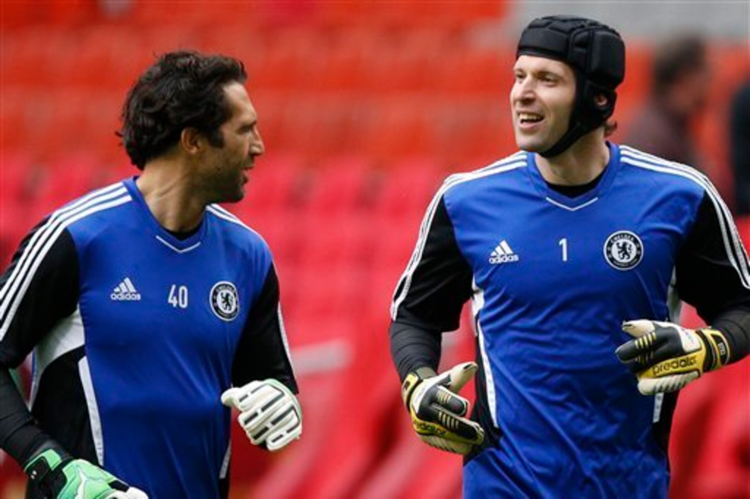 Chelsea may start longtime backup Henrique Hilario (left) against Liverpool on Sunday with Petr Cech (right) out for the season with a shoulder injury.