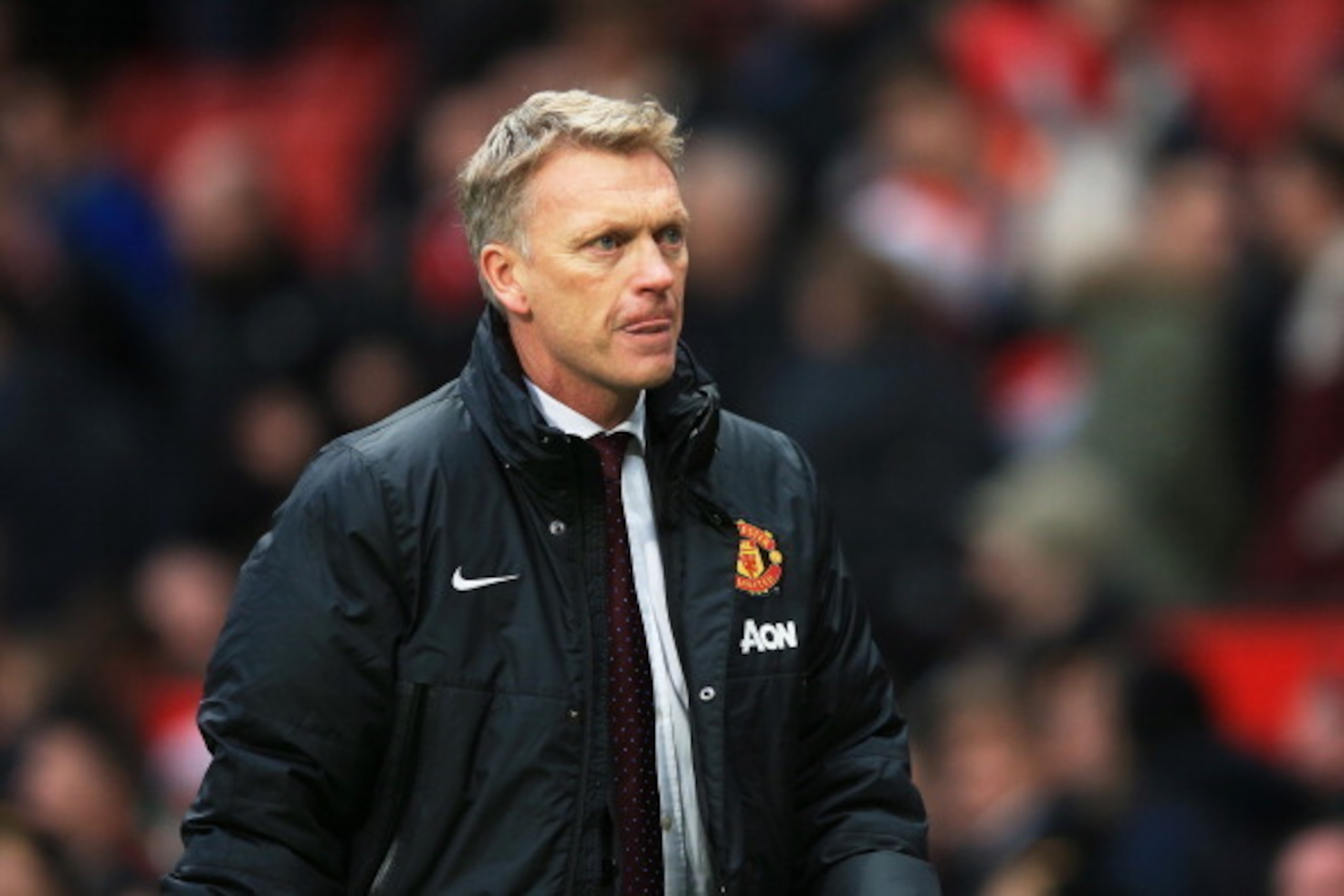 MANCHESTER, ENGLAND - DECEMBER 07:  A dejected David Moyes the Manchester United manager walks off the pitch following his team's 1-0 defeat during the Barclays Premier League match between Manchester United and Newcastle United at Old Trafford on Decembe