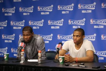 MEMPHIS, TN - APRIL 24: Kevin Durant #35 and Russell Westbrook #0 of the Oklahoma City Thunder address the media after Game Three of the Western Conference Quarterfinals against the Memphis Grizzlies during the 2014 NBA Playoffs on April 24, 2014 at FedEx