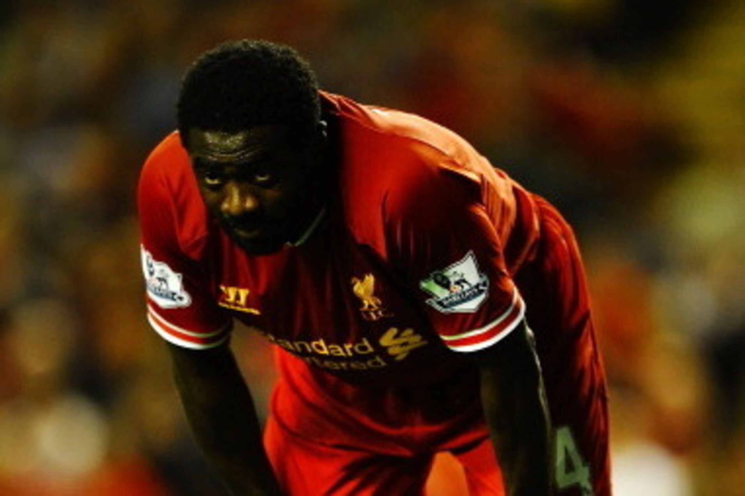 LIVERPOOL, ENGLAND - AUGUST 27:  Kolo Toure of Liverpool looks on during the Capital One Cup Second Round between Liverpool and Notts County at Anfield on August 27, 2013 in Liverpool, England.  (Photo by Laurence Griffiths/Getty Images)