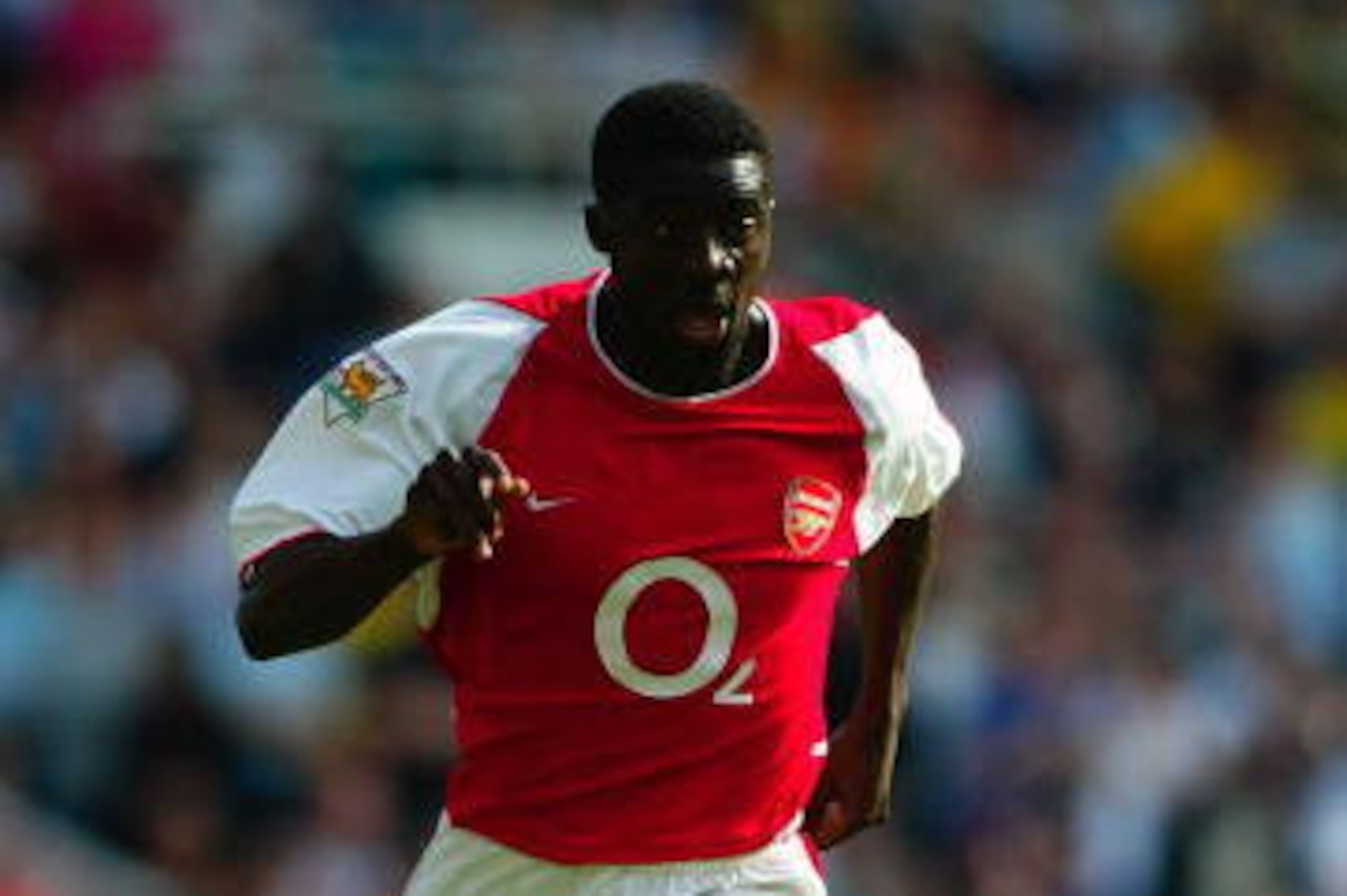 LONDON - MAY 4:  Kolo Toure of Arsenal brings the ball out of defence during the FA Barclaycard Premiership match between Arsenal and Leeds United held on May 4, 2003 at Highbury, in London. Leeds United won the match 3-2. (Photo by Ben Radford/Getty Imag