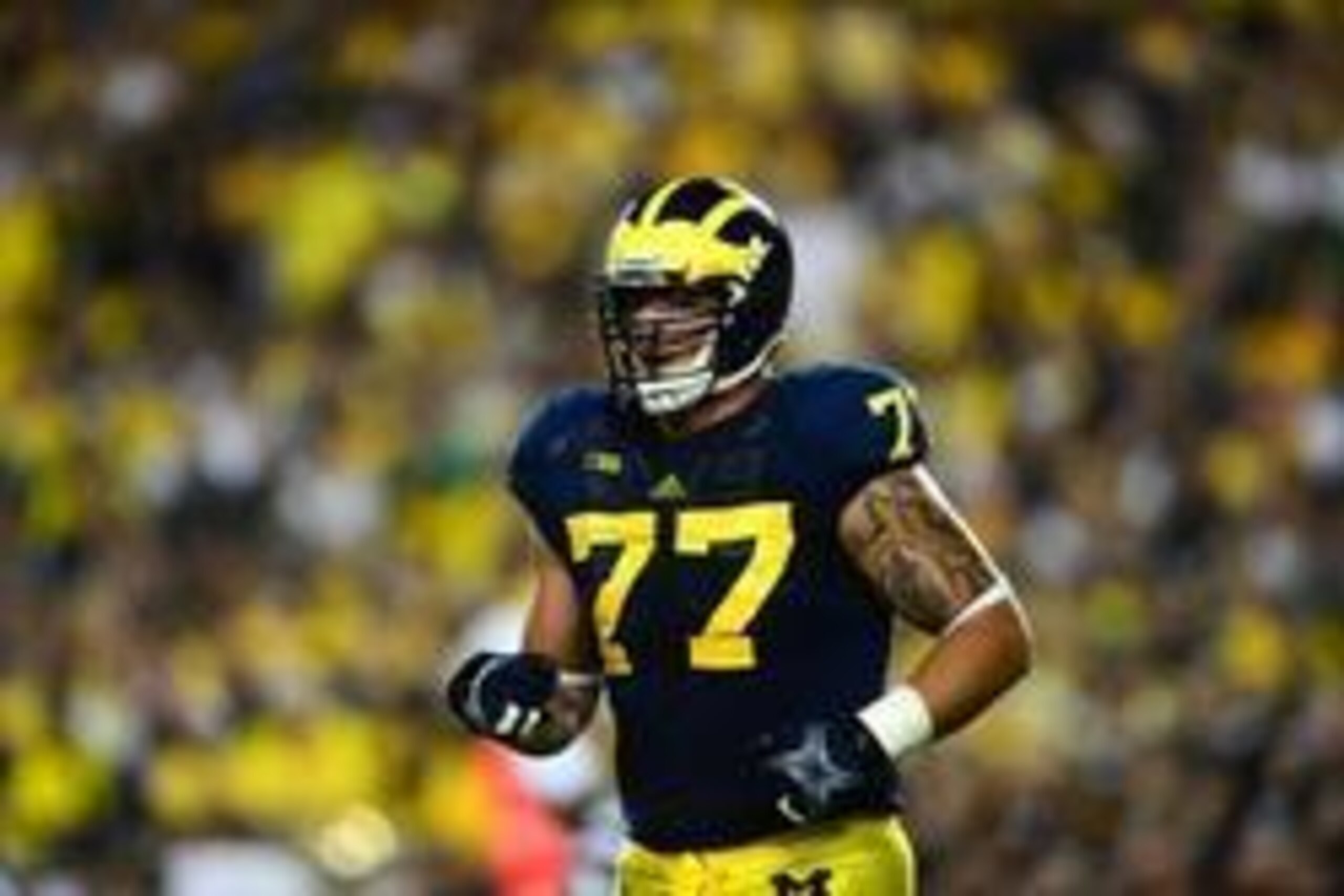 Sep 7, 2013; Ann Arbor, MI, USA; Michigan Wolverines offensive linesman Taylor Lewan (77) against the Notre Dame Fighting Irish at Michigan Stadium. Mandatory Credit: Andrew Weber-USA TODAY Sports Sep 7, 2013; Ann Arbor, MI, USA; Michigan Wolverines offensive linesman Taylor Lewan (77) against the Notre Dame Fighting Irish at Michigan Stadium. Mandatory Credit: Andrew Weber-USA TODAY Sports