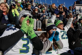 SEATTLE, WA - FEBRUARY 05:  Seattle Seahawks fans cheer in a designated 'moment of noise' at ceremonies during the Super Bowl XLVIII Victory Parade at CenturyLink Field on February 5, 2014 in Seattle, Washington.  (Photo by Otto Greule Jr/Getty Images)