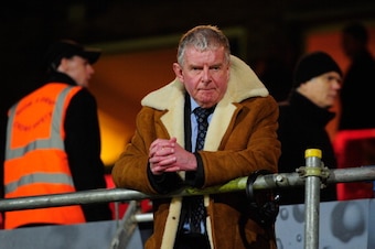 CHELTENHAM, ENGLAND - JANUARY 07:  Commentator John Motson looks on prior to the FA Cup with Budweiser Third Round match between Cheltenham Town and Everton at Abbey Business Stadium on January 7, 2013 in Cheltenham, England.  (Photo by Stu Forster/Getty 