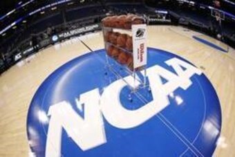 Mar 20, 2014; Orlando, FL, USA; General view of basketballs on the NCAA logo prior to a men's college basketball game between the Colorado Buffaloes and Pittsburgh Panthers during the second round of the 2014 NCAA Tournament at Amway Center. Mandatory Cre