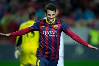 SEVILLE, SPAIN - FEBRUARY 09:  Cesc Fabregas of FC Barcelona celebrates scoring their fourth goal during the La Liga match between Sevilla FC and FC Barcelona at Estadio Ramon Sanchez Pizjuan on February 9, 2014 in Seville, Spain.  (Photo by Gonzalo Arroy